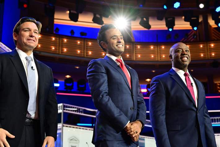 Florida Governor Ron DeSantis, entrepreneur Vivek Ramaswamy, and US Senator from South Carolina Tim Scott attend the third Republican presidential primary debate at the Knight Concert Hall at the Adrienne Arsht Center for the Performing Arts in Miami, Florida, on November 8, 2023. (Photo by Giorgio Viera / AFP)