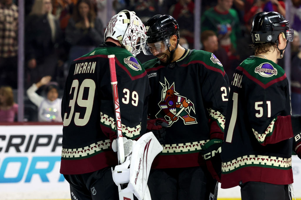 Connor Ingram celebrates a victory with his D-Man Matt Dumba