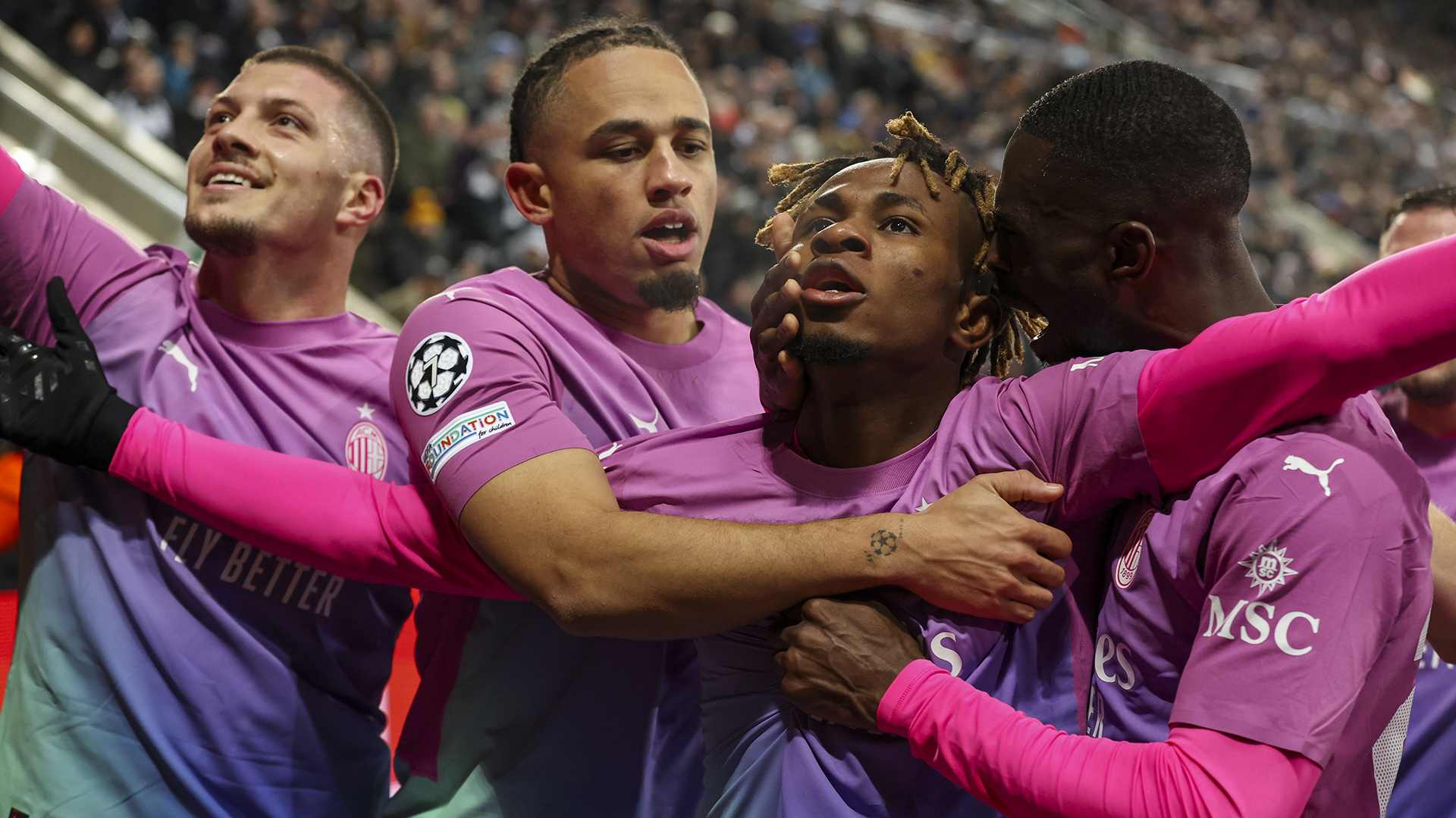 AC Milan's Samuel Chukwueze celebrates scoring his side's second goal during the UEFA Champions League match between Newcastle United FC and AC Milan at St. James Park on December 13, 2023 in Newcastle upon Tyne, England.