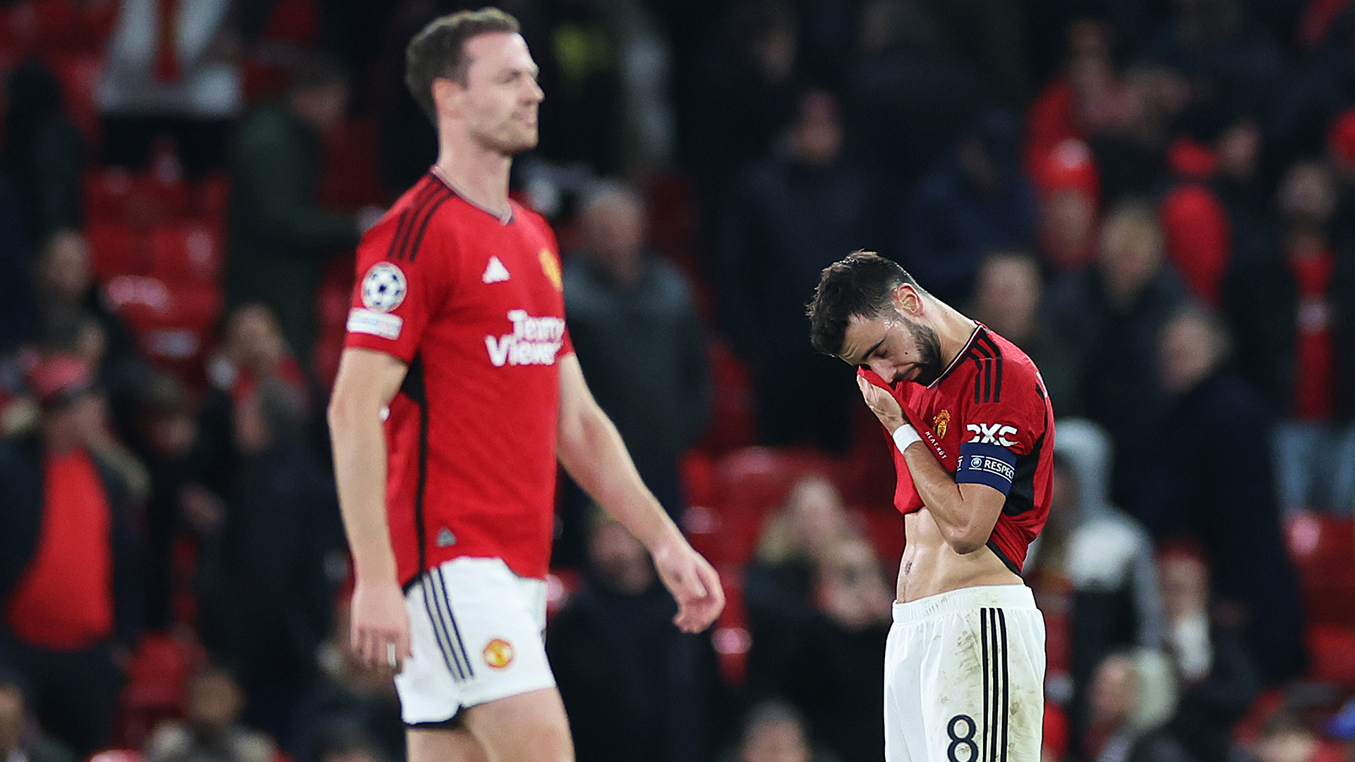 Bruno Fernandes of Manchester United looks dejected at full-time following the team's defeat in the UEFA Champions League match between Manchester United and FC Bayern München at Old Trafford on December 12, 2023 in Manchester, England.