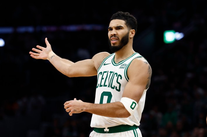 Jayson Tatum gestures in confusion.