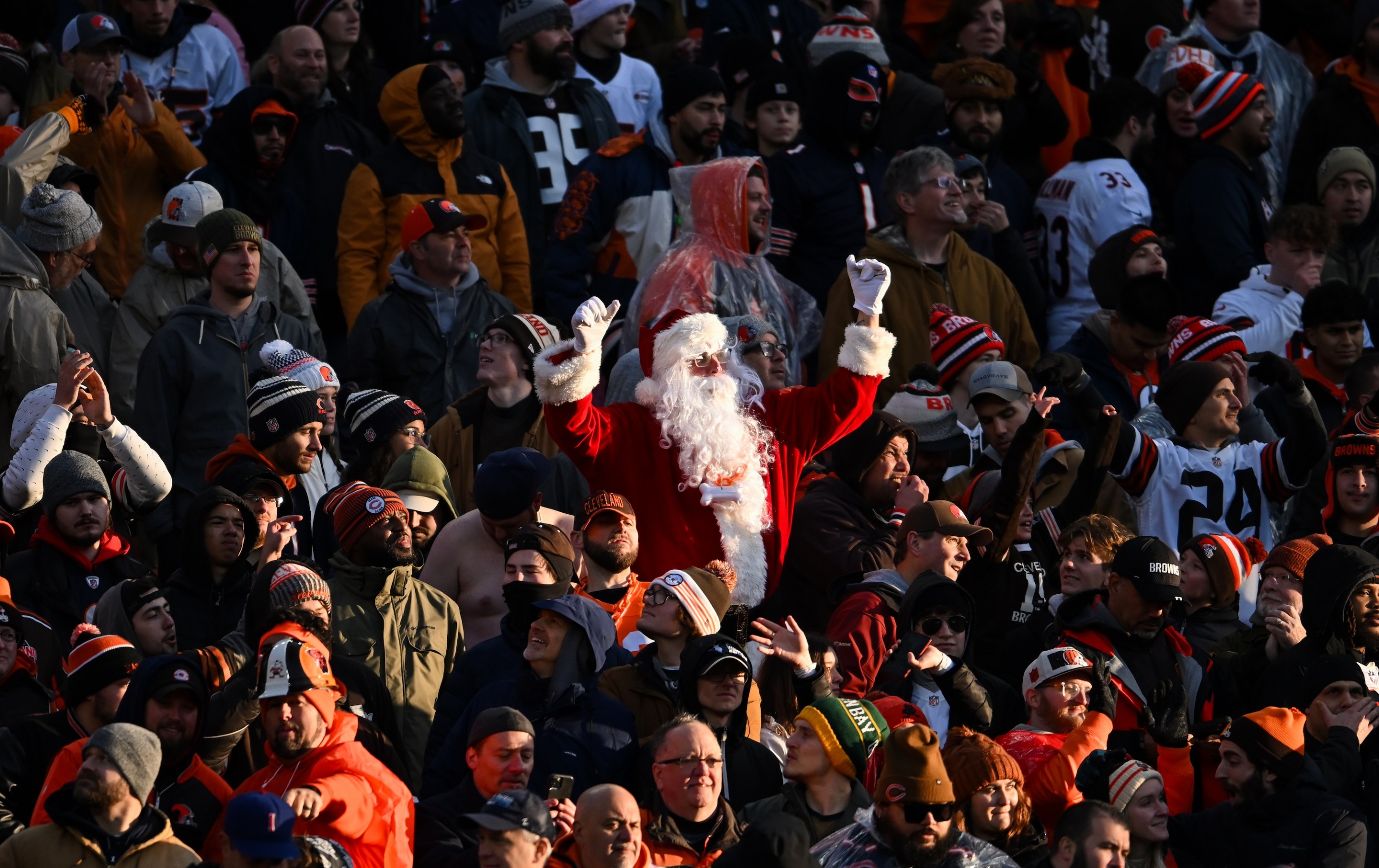 CLEVELAND, OHIO - DECEMBER 17: A fan dressed as Santa Claus cheers during the second half between the Chicago Bears and the Cleveland Browns at Cleveland Browns Stadium on December 17, 2023 in Cleveland, Ohio. (Photo by Nick Cammett/Diamond Images via Getty Images) *** Local Caption *** Santa Claus