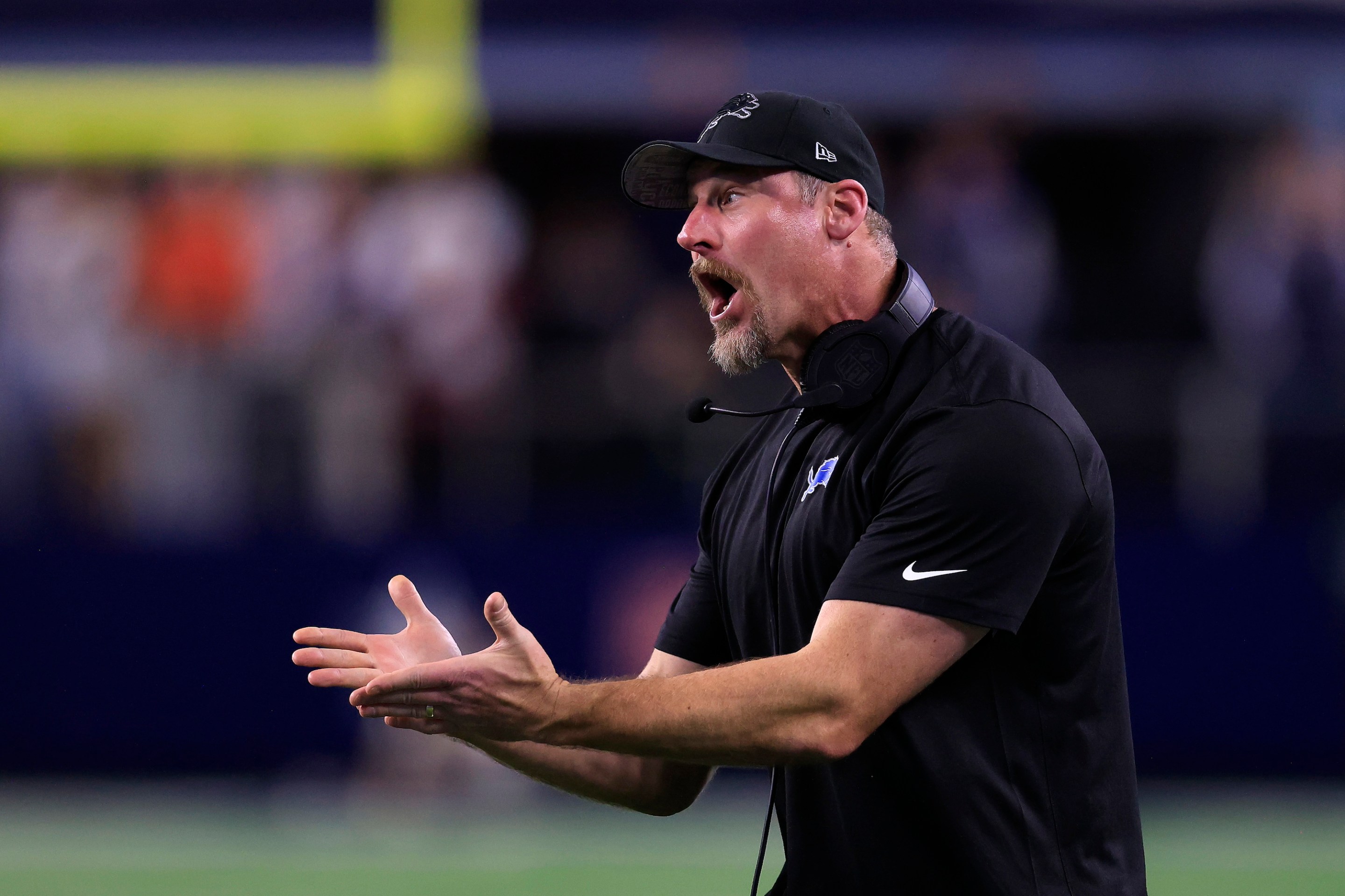 ARLINGTON, TEXAS - DECEMBER 30: Head coach Dan Campbell of the Detroit Lions reacts to a penalty during a two point conversion attempt against the Dallas Cowboys during the fourth quarter in the game at AT&amp;T Stadium on December 30, 2023 in Arlington, Texas. (Photo by Ron Jenkins/Getty Images)