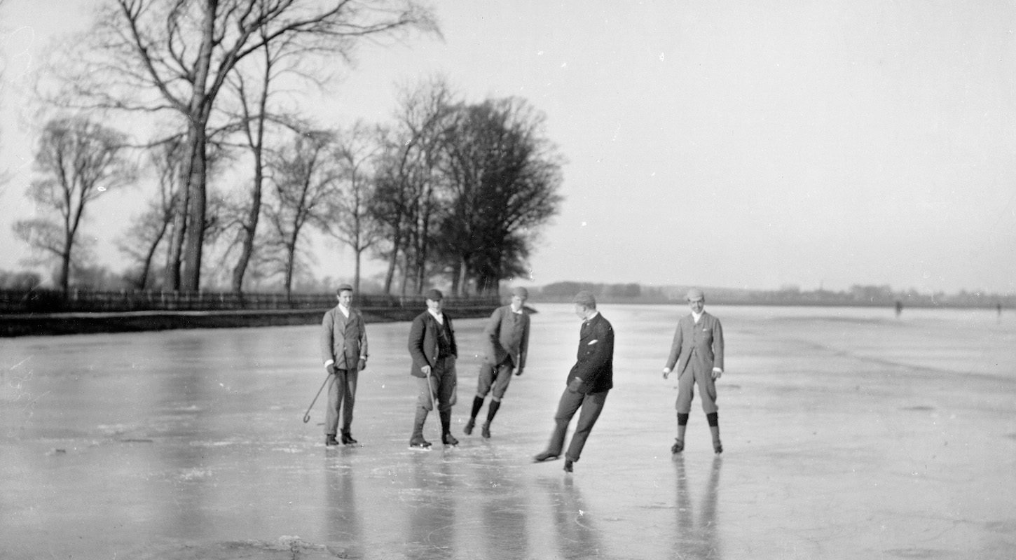 Men playing ice hockey on the frozen Medley Port Meadow, Oxford, Oxfordshire, c1860-c1922. Artist: Henry Taunt