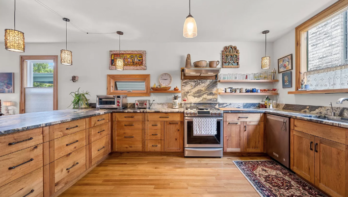 kitchen with wood cabinets and big window