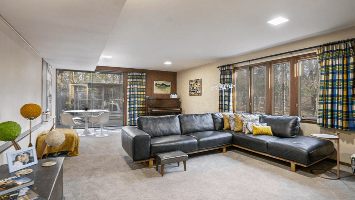 big family room with giant leather couch