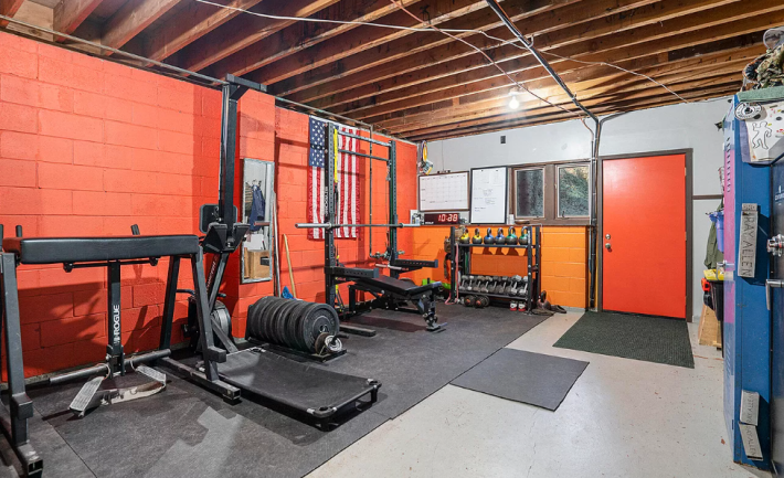 weight room with red door