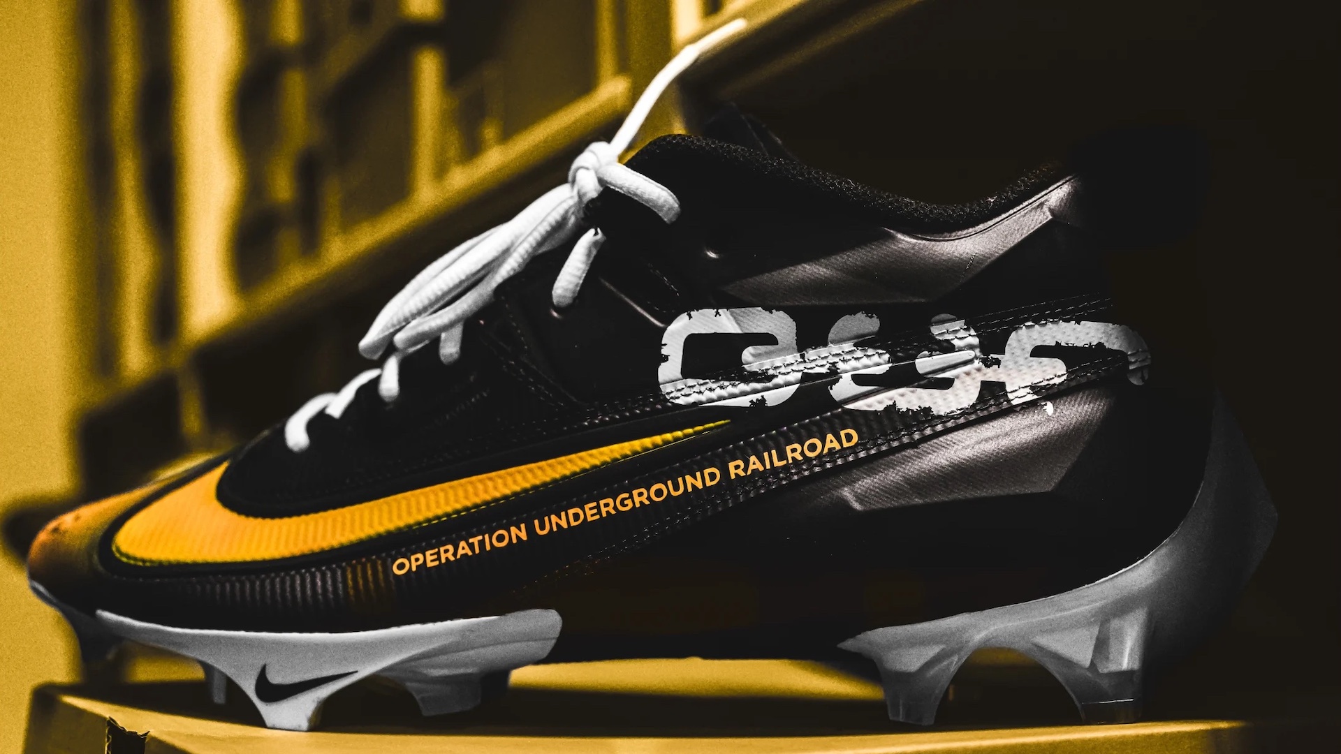 Nick Bawden's cleats advertising Operation Underground Railroad