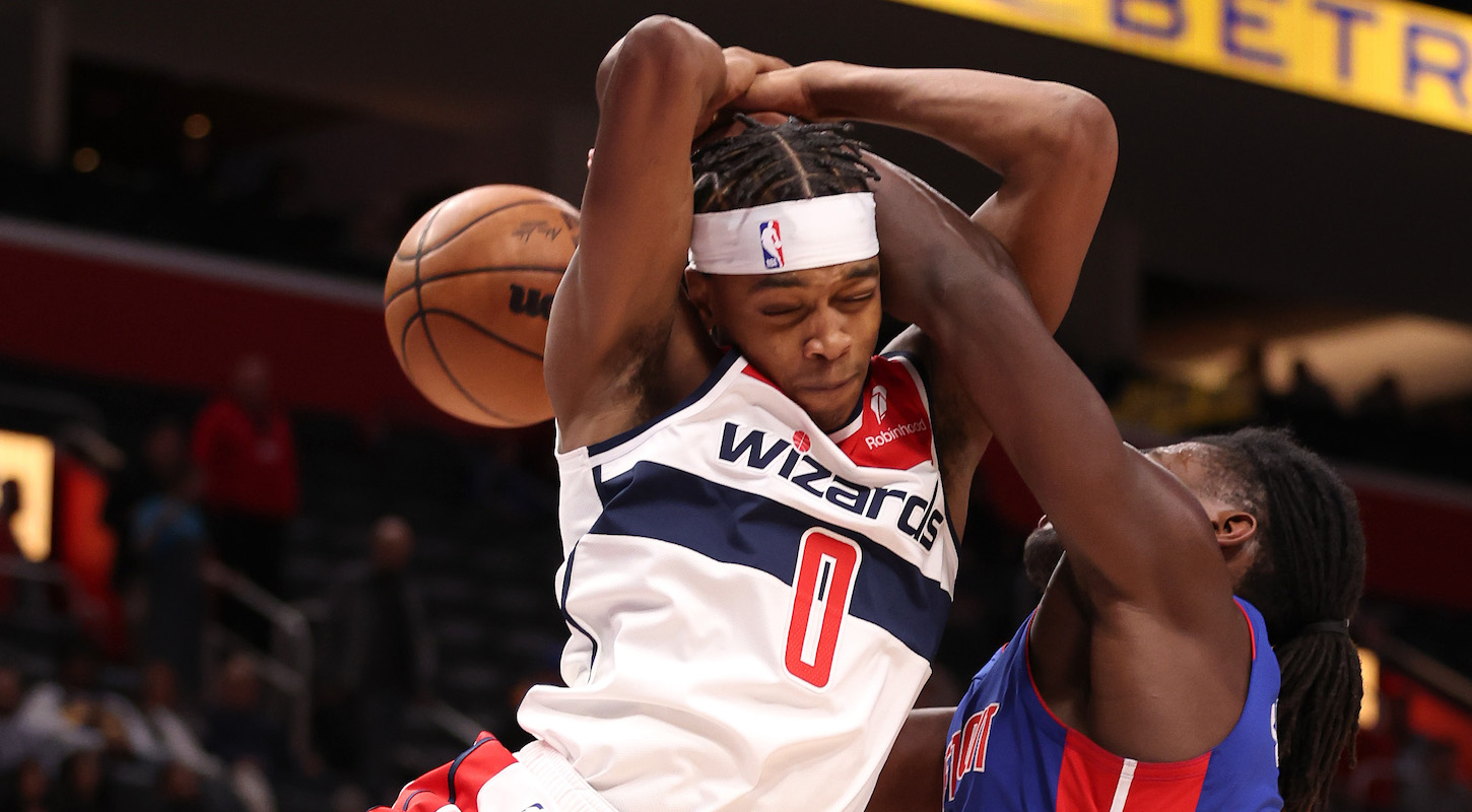 Bilal Coulibaly #0 of the Washington Wizards battles for control of the ball against Isaiah Stewart #28 of the Detroit Pistons during the second half at Little Caesars Arena on November 27, 2023 in Detroit, Michigan. Washington won the game 126-107.