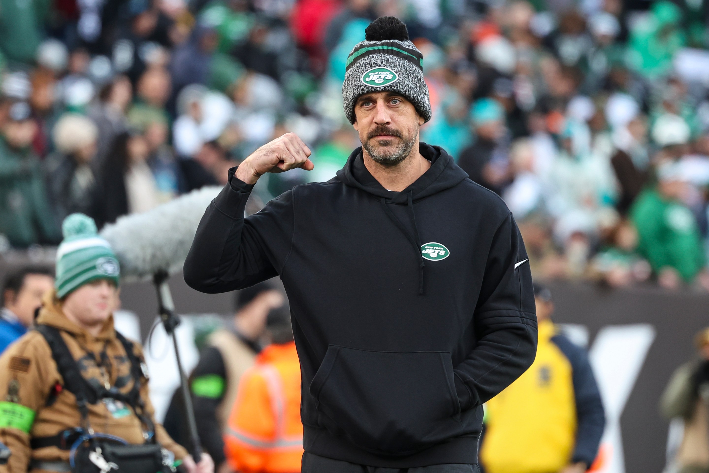 Aaron Rodgers #8 of the New York Jets looks on from the sideline prior to an NFL football game against the Miami Dolphins at MetLife Stadium on November 24, 2023 in East Rutherford, New Jersey.