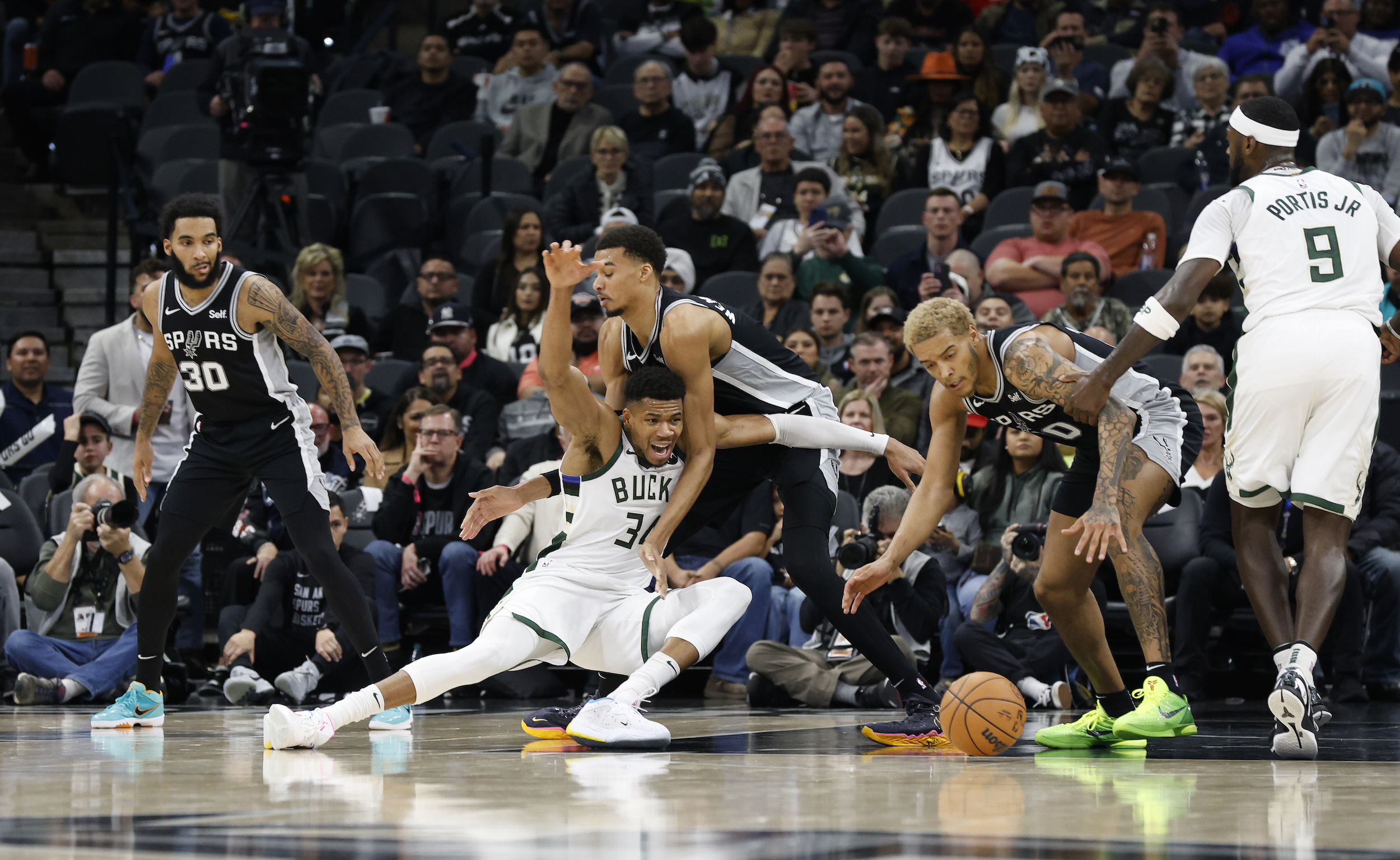 Victor Wembanyama and Giannis Antetokounmpo get their limbs tangled.