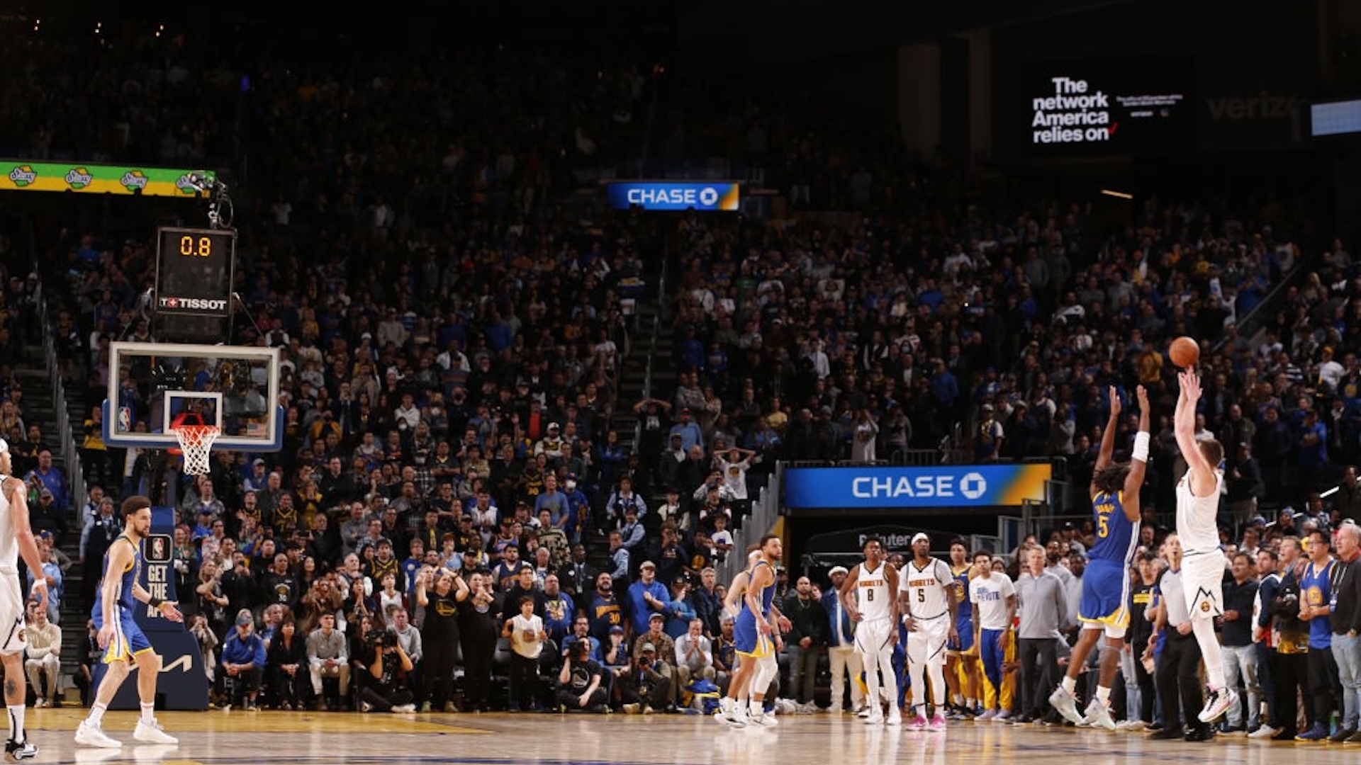 Nikola Jokic #15 of the Denver Nuggets shoots the game winner three point basket during the game against the Golden State Warriors on January 4, 2024 at Chase Center in San Francisco, California. J