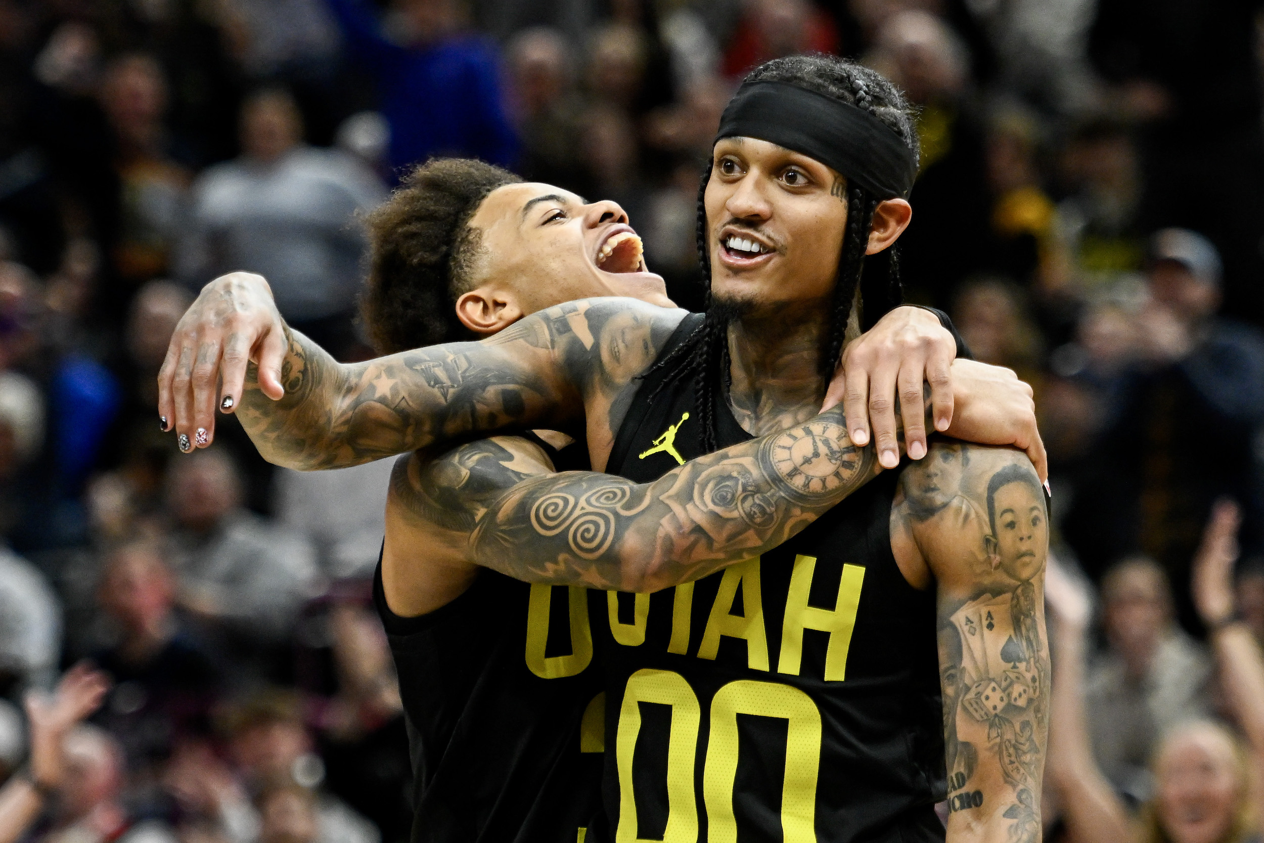 Jordan Clarkson is congratulated by a teammate for recording a triple-double.