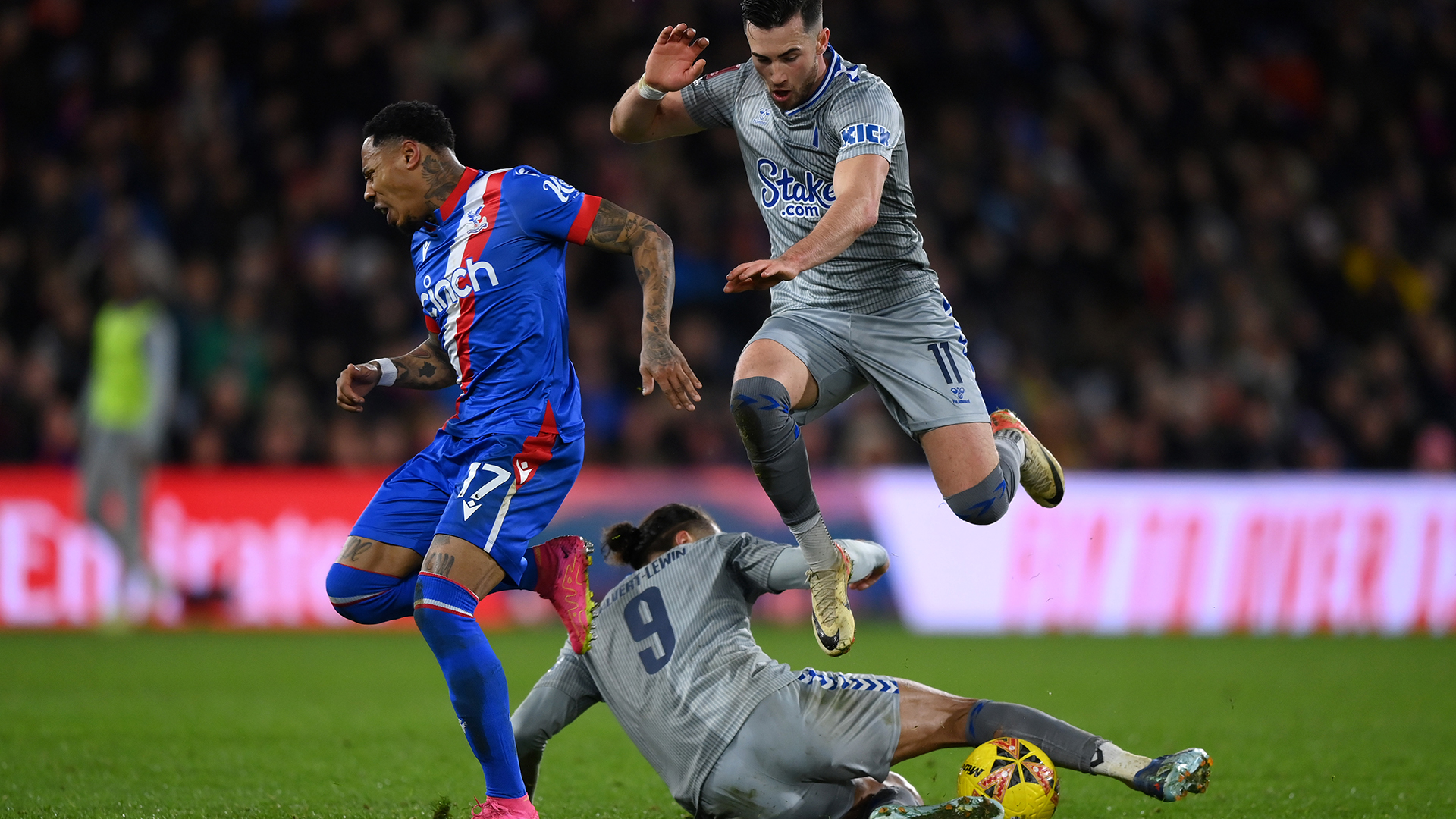 Nathaniel Clyne of Crystal Palace is challenged by Dominic Calvert-Lewin and Jack Harrison of Everton, leading to a red card for Dominic Calvert-Lewin, during the Emirates FA Cup Third Round match between Crystal Palace and Everton at Selhurst Park on January 04, 2024 in London, England.