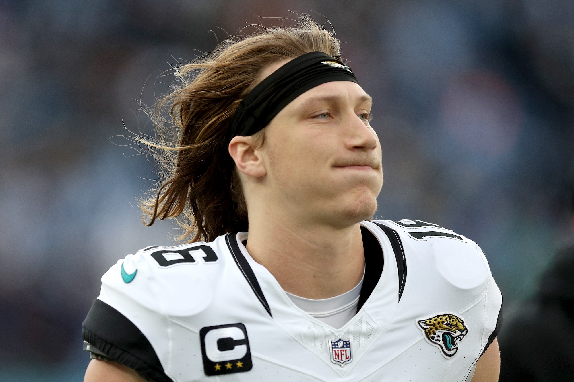 NASHVILLE, TENNESSEE - JANUARY 07: Trevor Lawrence #16 of the Jacksonville Jaguars runs off the field during halftime against the Tennessee Titans at Nissan Stadium on January 07, 2024 in Nashville, Tennessee. (Photo by Justin Ford/Getty Images)