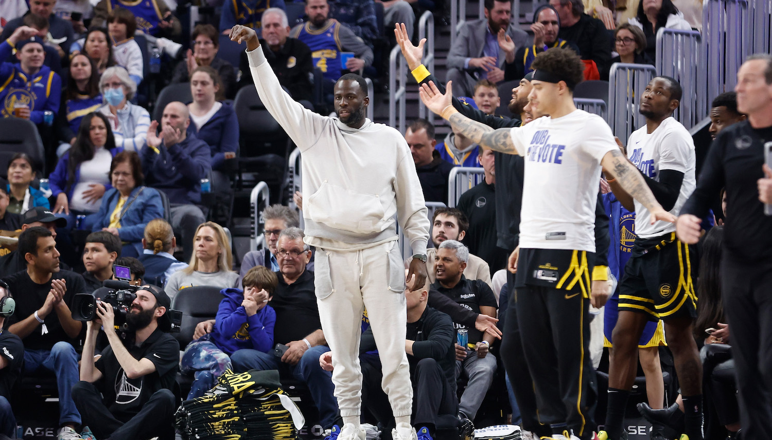 SAN FRANCISCO, CALIFORNIA - JANUARY 07: Draymond Green #23 of the Golden State Warriors looks on from the bench during the game against the Toronto Raptors at Chase Center on January 07, 2024 in San Francisco, California. NOTE TO USER: User expressly acknowledges and agrees that, by downloading and or using this photograph, User is consenting to the terms and conditions of the Getty Images License Agreement. (Photo by Lachlan Cunningham/Getty Images)