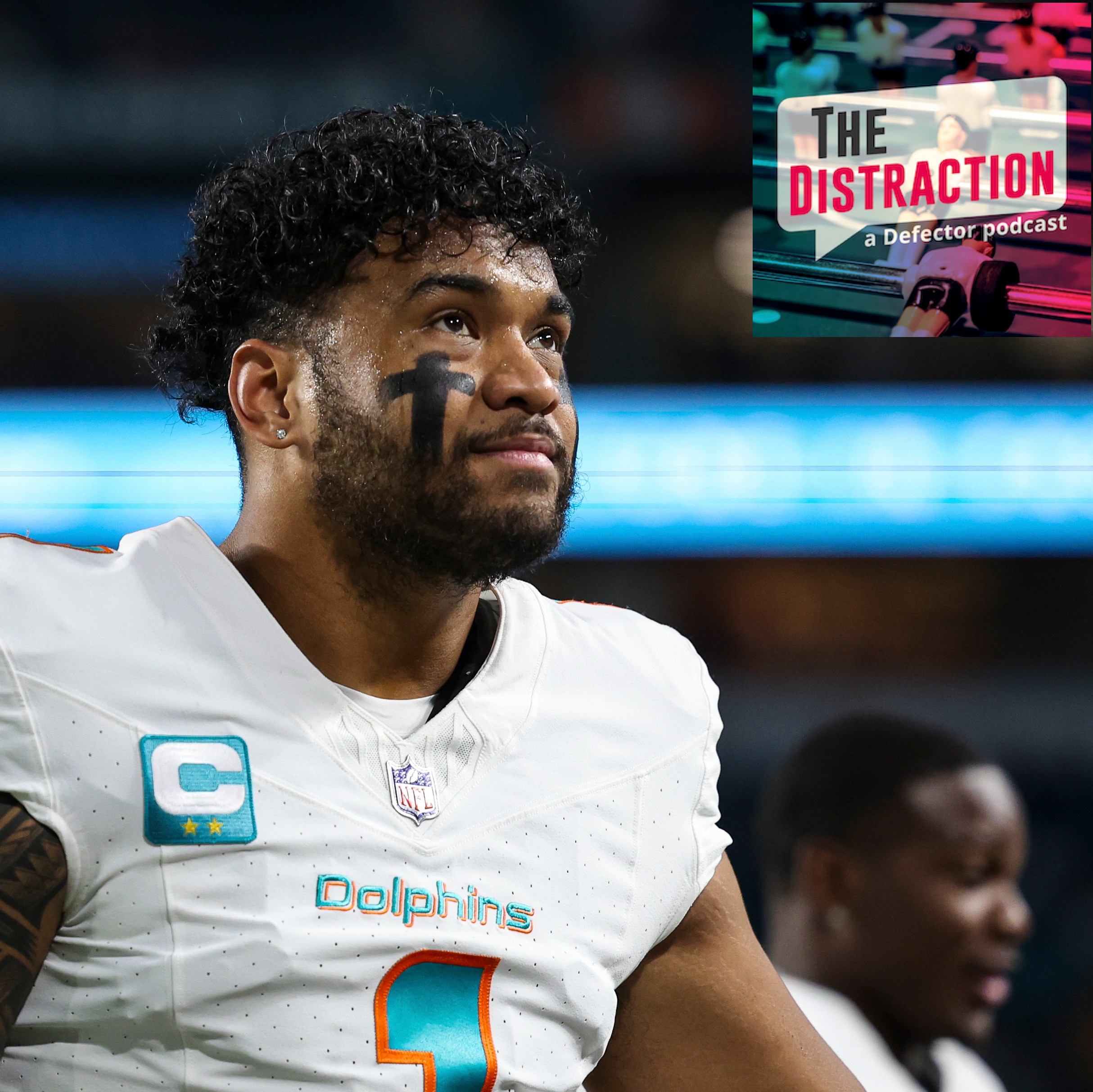 Tua Tagovailoa makes a semi-Jim Face during warm-ups before the Dolphins' Week 18 loss to the Buffalo Bills.