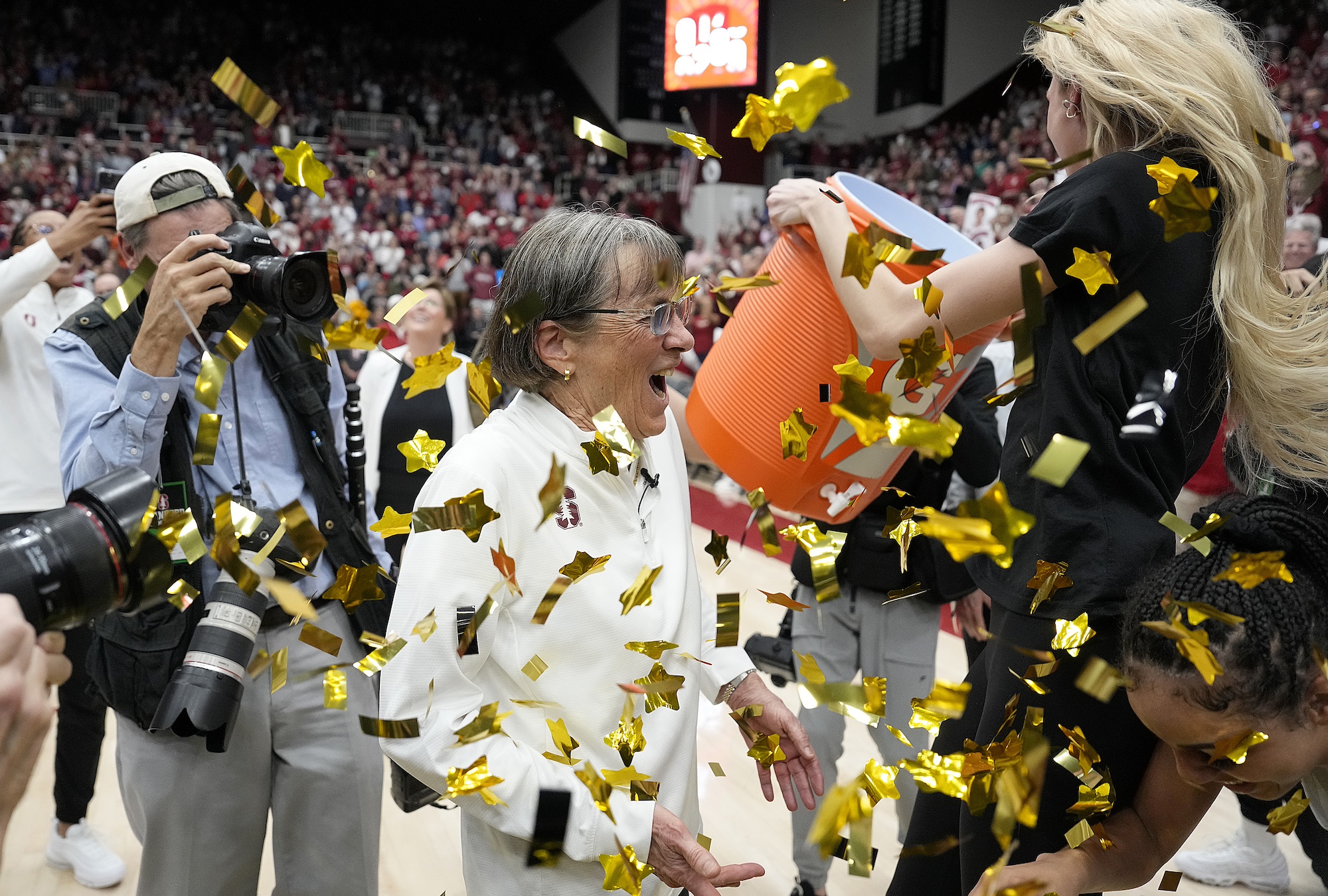 PALO ALTO, CALIFORNIA - JANUARY 21: Head coach Tara VanDerveer of the Stanford Cardinal celebrates with her player Cameron Brink #22 after Stanford defeated the Oregon State Beavers 65-56 at Stanford Maples Pavilion on January 21, 2024 in Palo Alto, California. Tara VanDerveer recorded her 1,203 NCAA career victory passing Mike Krzyzewski with 1,202 NCAA career wins. (Photo by Thearon W. Henderson/Getty Images)