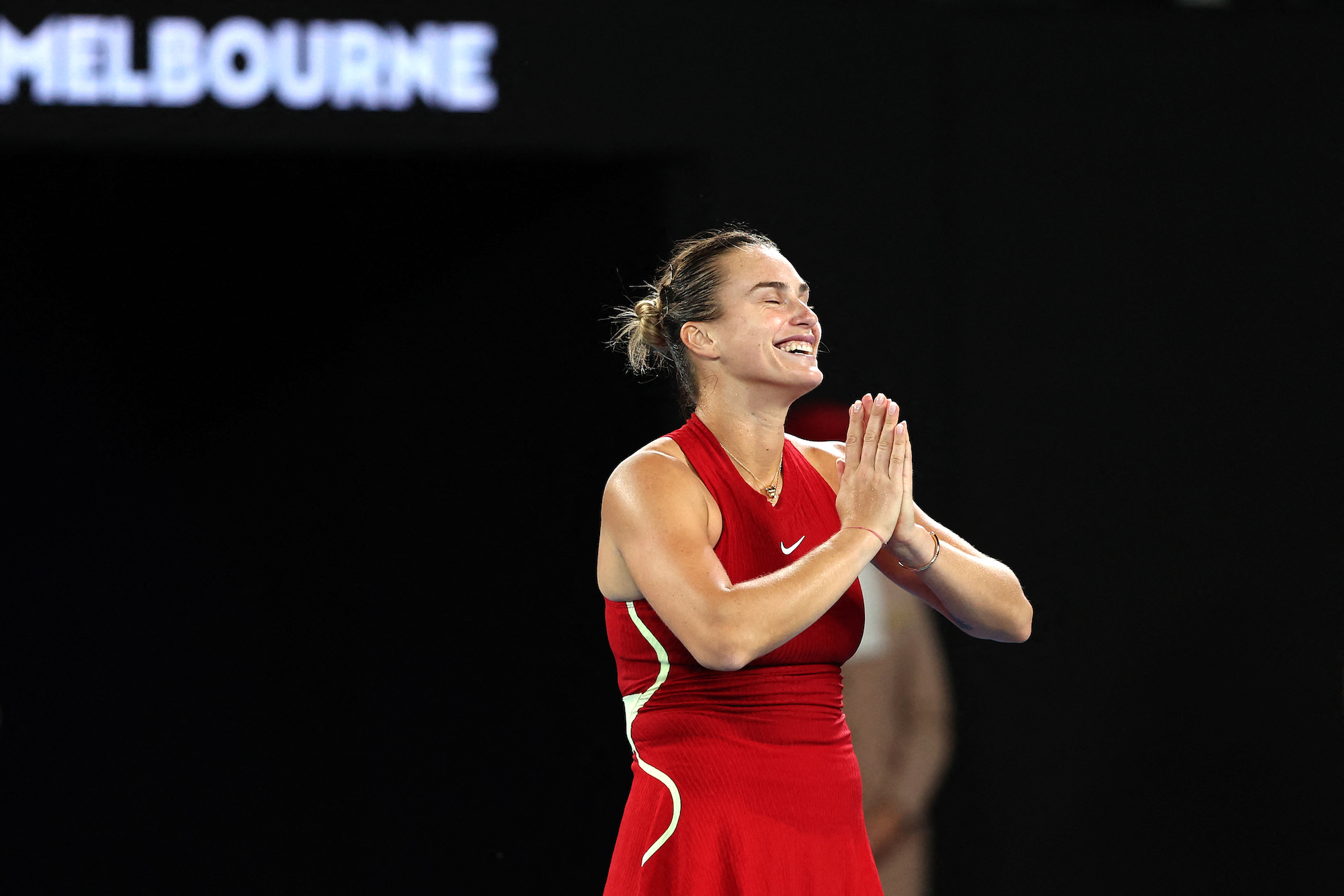 Aryna Sabalenka folds her hands after beating Coco Gauff in the Australian Open semifinal