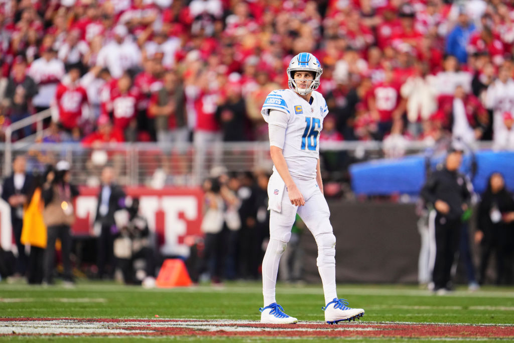 Jared Goff walks down the field