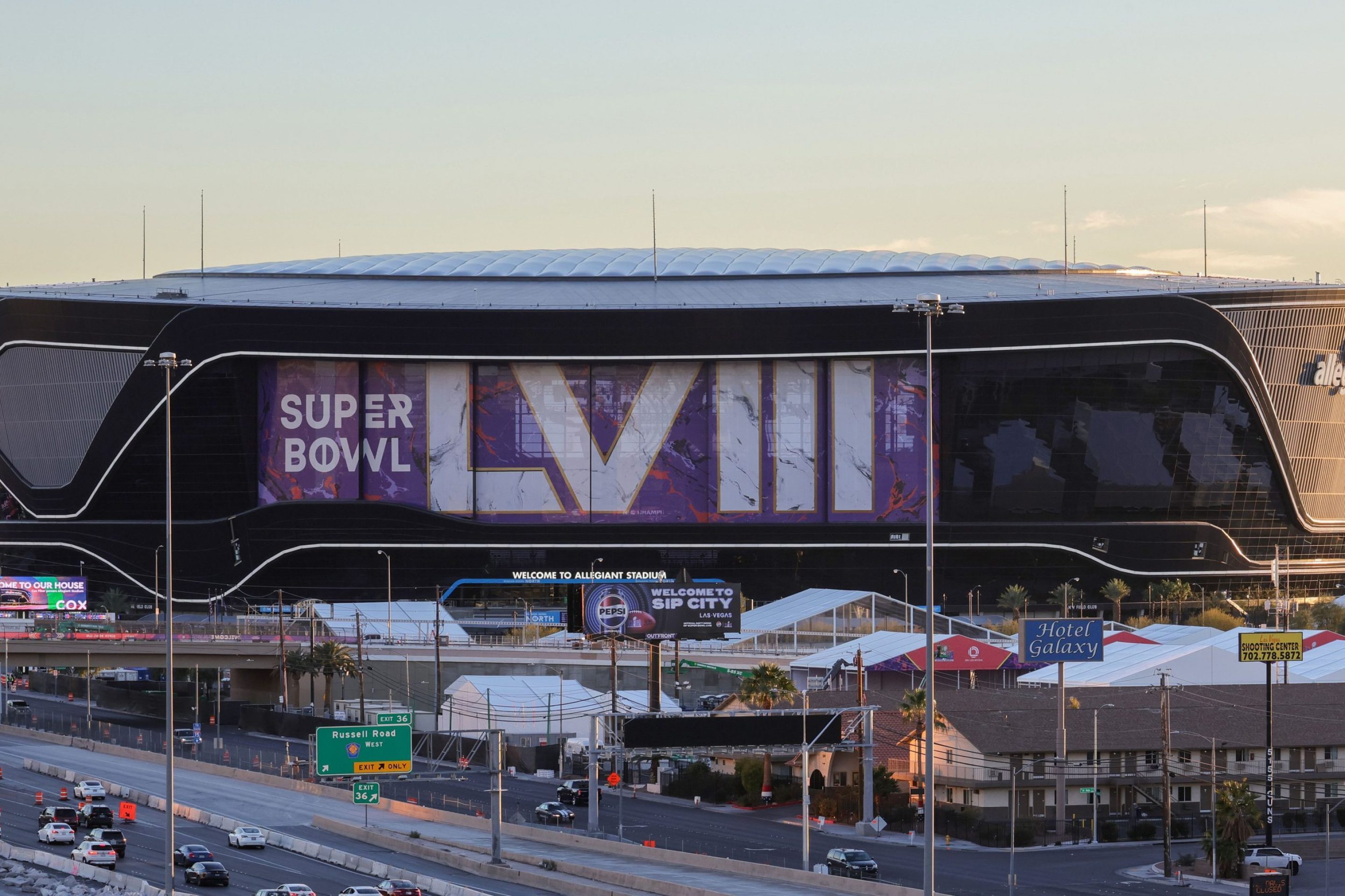An exterior view shows signage for Super Bowl LVIII at Allegiant Stadium on January 30, 2024 in Las Vegas, Nevada. The game will be played on February 11, 2024, between the Kansas City Chiefs and the San Francisco 49ers.