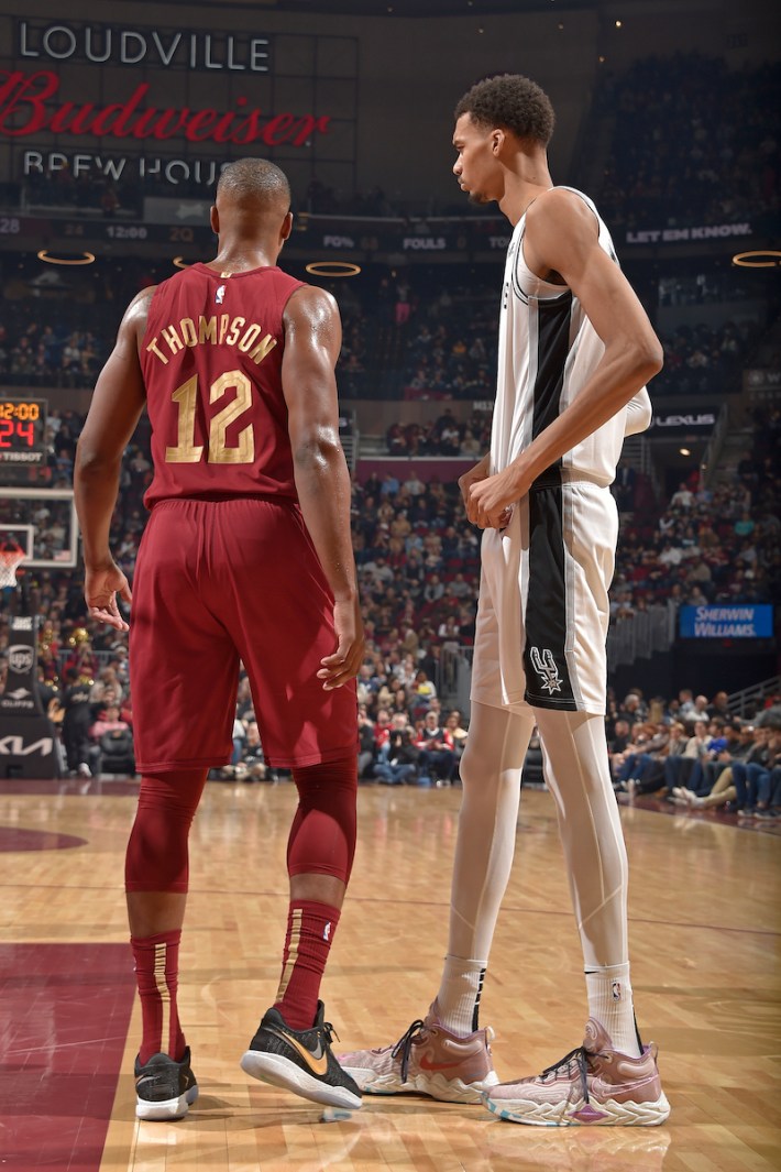 CLEVELAND, OH - JANUARY 7: Victor Wembanyama #1 of the San Antonio Spurs and Tristian Thompson #12 of the Cleveland Cavaliers look on during the game on January 7, 2024 at Rocket Mortgage FieldHouse in Cleveland, Ohio.