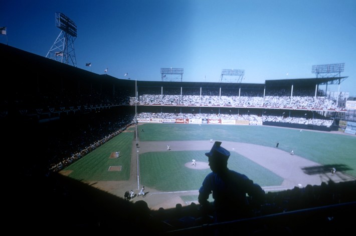 vendor's silhouette in the stands during Game 4 of the 1955 World Series game between the New York Yankees and Brooklyn Dodgers on October 1, 1955 at Ebbets Field in Brooklyn, New York.