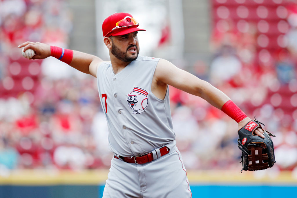 CINCINNATI, OH - JULY 07: Eugenio Suarez #7 of the Cincinnati Reds throws the ball against the Cleveland Indians in the third inning at Great American Ball Park on July 7, 2019 in Cincinnati, Ohio.