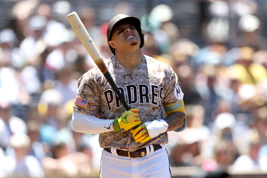Manny Machado reacts after striking out