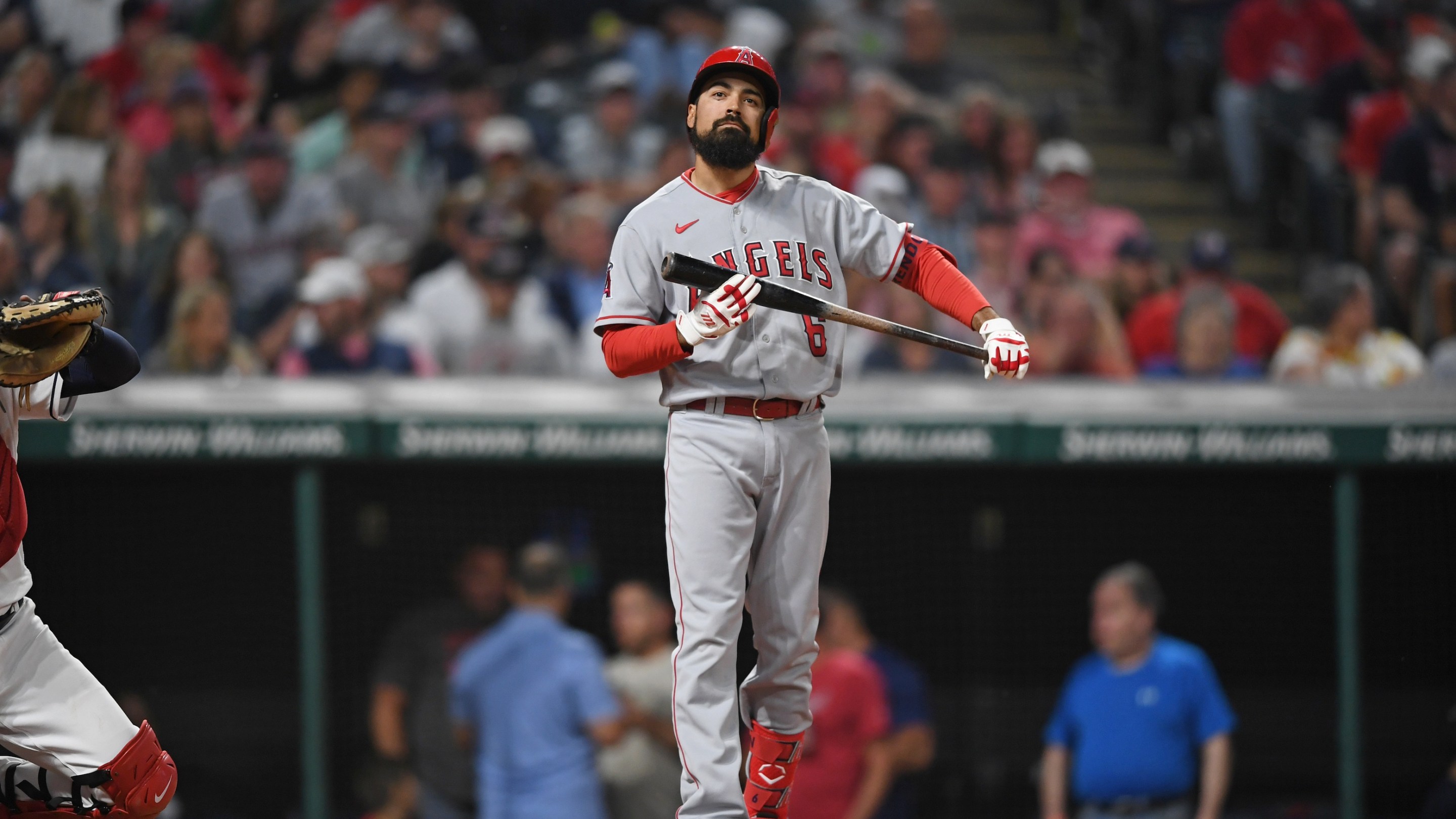 Anthony Rendon walks away from the plate with a faraway, faintly sad look on his face after striking out against Cleveland in a game in May of 2023.