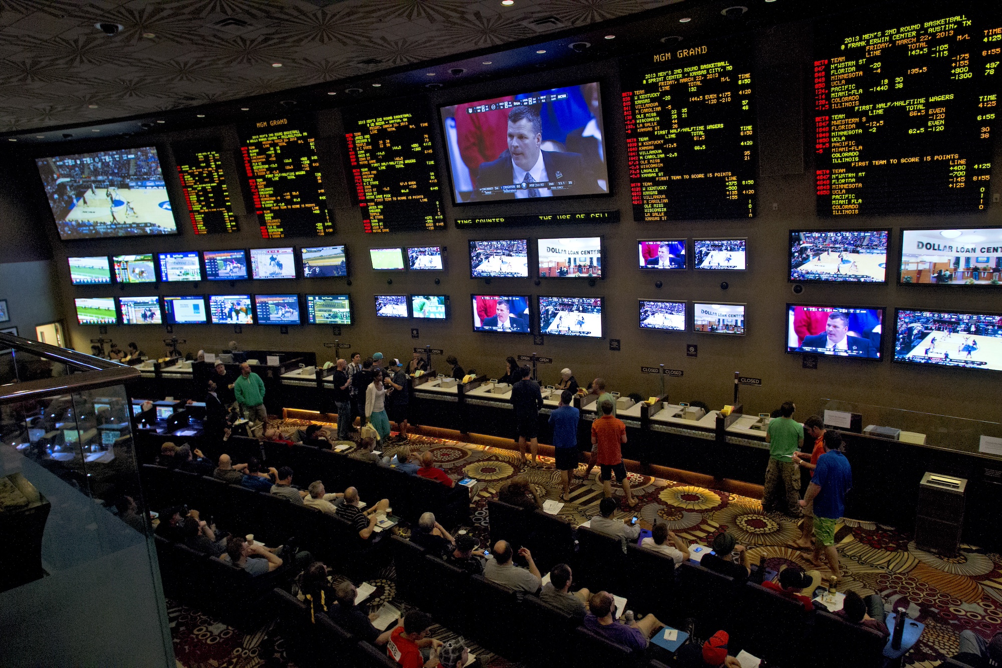 College Basketball: NCAA Playoffs: View of sports book patrons betting on March Madness games at MGM Grand Hotel &amp; Casino. Las Vegas, NV 3/21/2013 CREDIT: Chris Farina (Photo by Chris Farina /Sports Illustrated/Getty Images) (Set Number: X156296 TK2 R1 F31 )