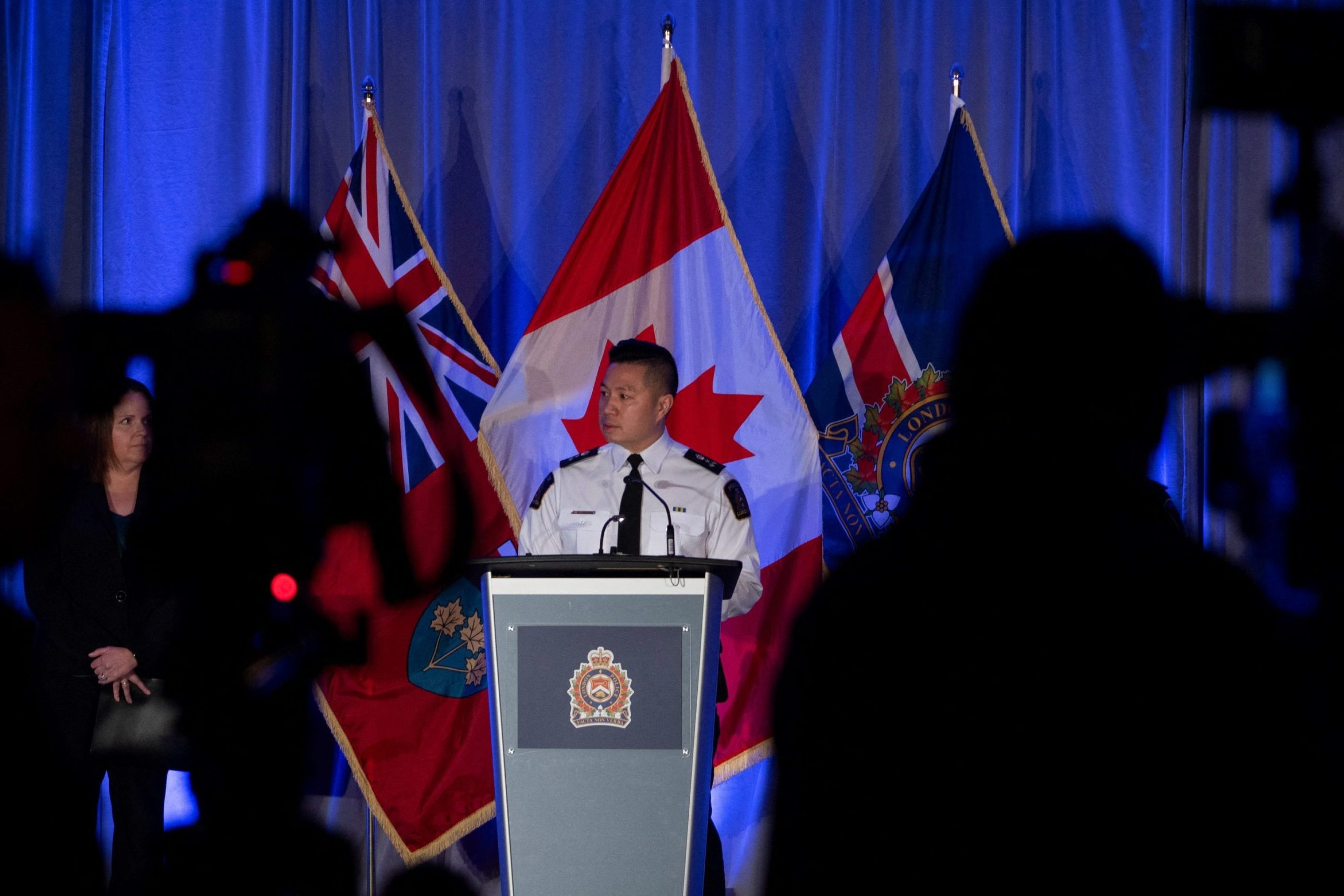 London Police Service Chief Thai Troung, center, and Detective Sgt. Katherine Dann of Sexual Assault and Child Abuse Section hold a press conference in London, Ontario, on February 5, 2024.