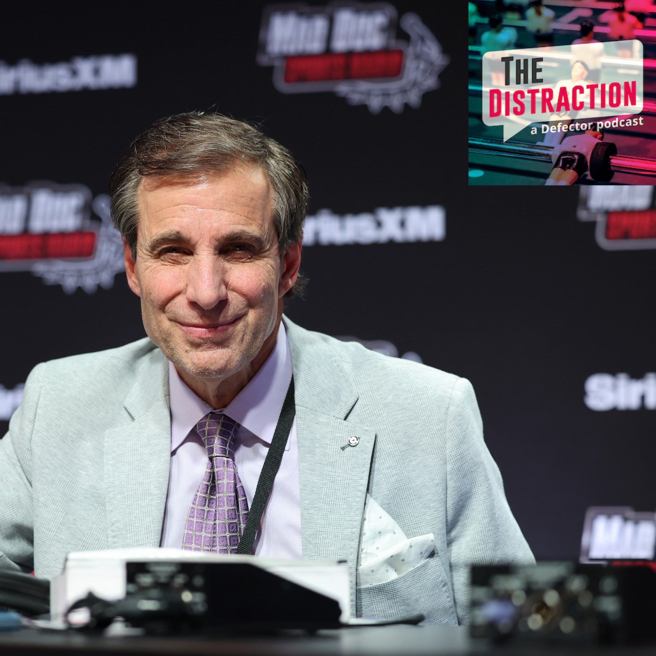 Chris "Mad Dog" Russo looking smug or sleepy, depending on your perspective, on radio row in Las Vegas before the Super Bowl.