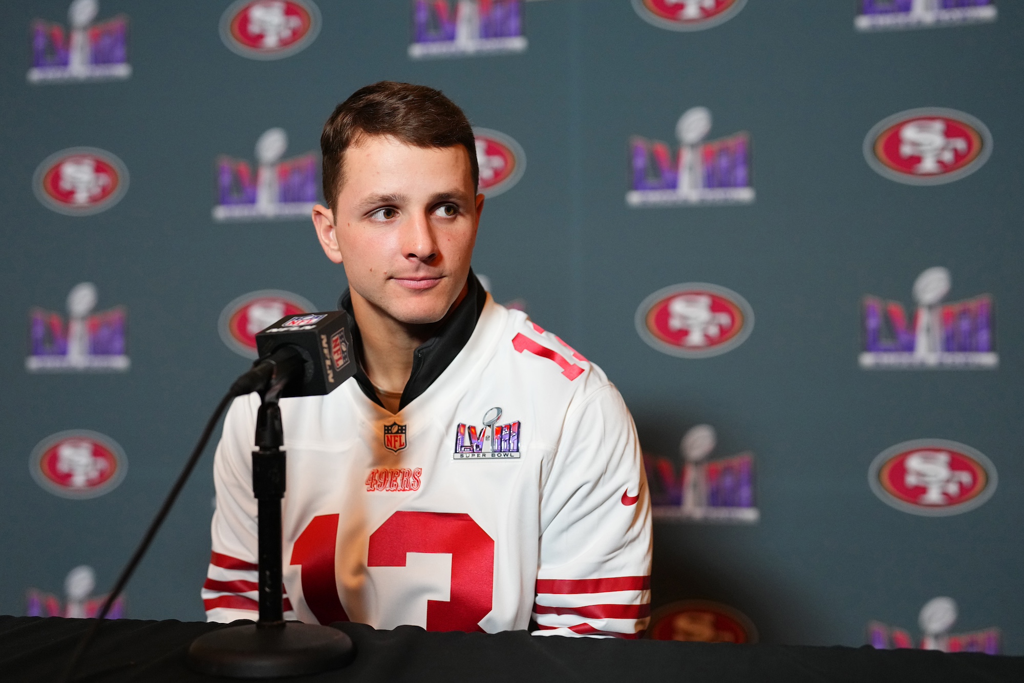 HENDERSON, NEVADA - FEBRUARY 08: Brock Purdy #13 of the San Francisco 49ers speaks to media during San Francisco 49ers media availability ahead of Super Bowl LVIII at Hilton Lake Las Vegas Resort and Spa on February 08, 2024 in Henderson, Nevada. (Photo by Chris Unger/Getty Images)