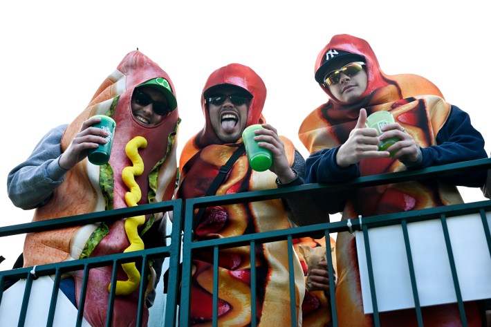 SCOTTSDALE, ARIZONA - FEBRUARY 09: Fans are seen dressed as hot dogs on the 16th hole during the continuation of the weather-delayed first round of the WM Phoenix Open at TPC Scottsdale on February 09, 2024 in Scottsdale, Arizona.