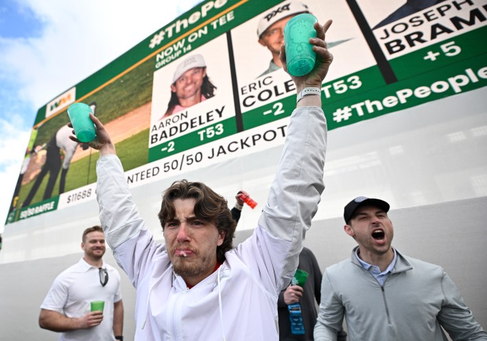 SCOTTSDALE, ARIZONA - FEBRUARY 10: Fans celebrate on the 16th green during the continuation of the second round of the WM Phoenix Open at TPC Scottsdale on February 10, 2024 in Scottsdale, Arizona.