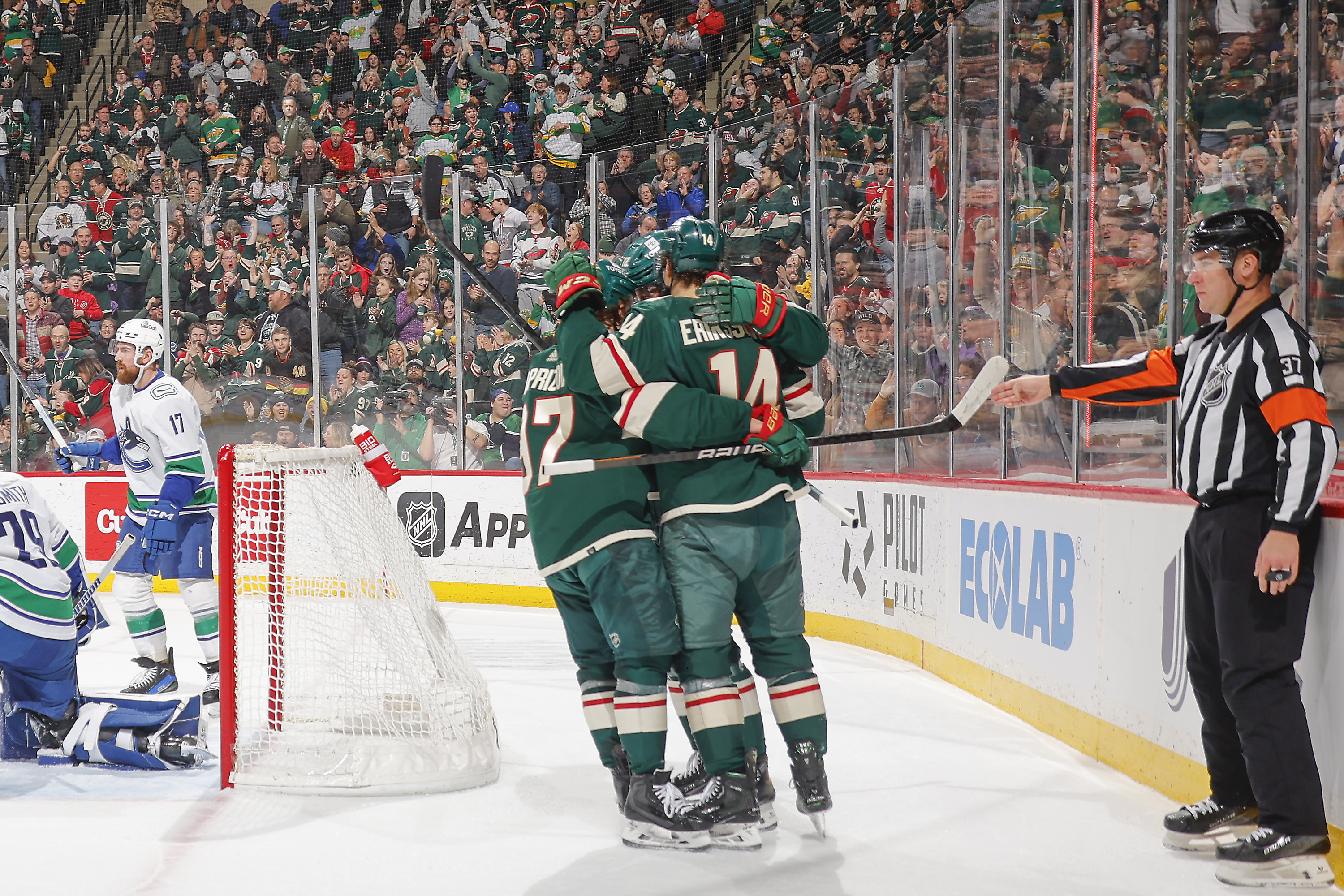 SAINT PAUL, MN - FEBRUARY 19: Joel Eriksson Ek #14 celebrates his goal with his teammates Kirill Kaprizov #97 and Matt Boldy #12 of the Minnesota Wild against the Vancouver Canucks during the game at the Xcel Energy Center on February 19, 2024 in Saint Paul, Minnesota. (Photo by Bruce Kluckhohn/NHLI via Getty Images)