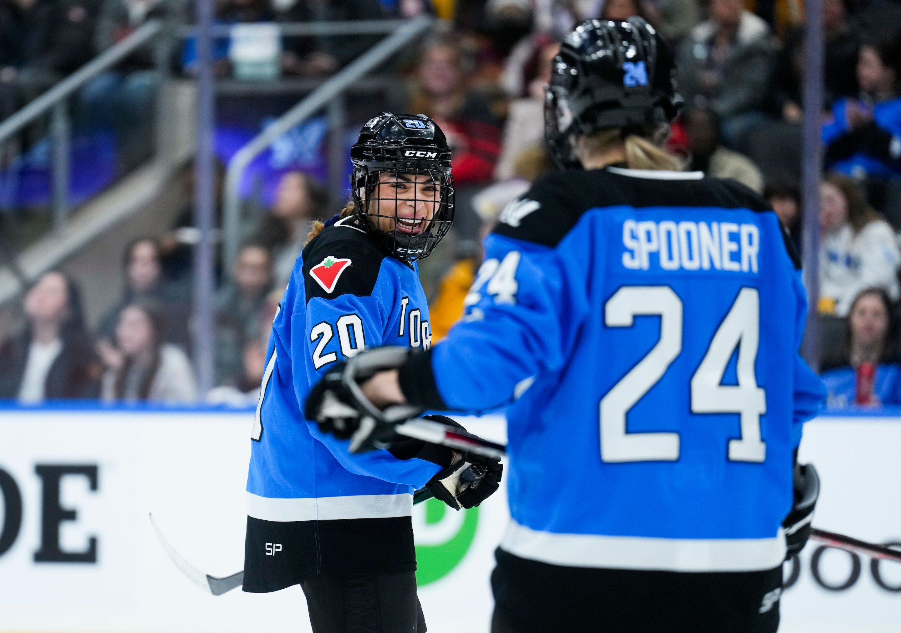 Sarah Nurse #20 of Toronto smiles in a break in play with Natalie Spooner #24 against Montreal during the first period of their PWHL hockey game at Scotiabank Arena on February 16, 2024 in Toronto, Canada.