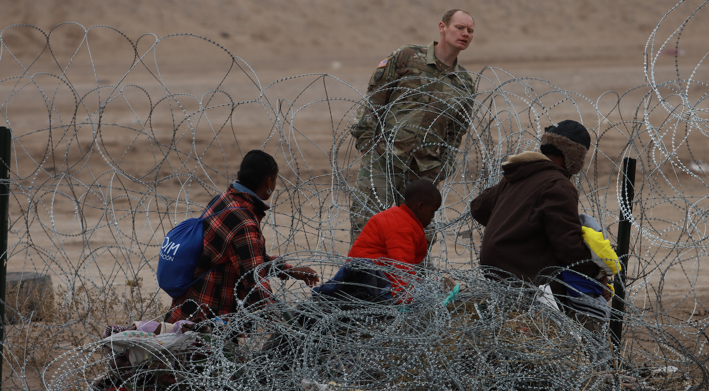 CIUDAD JUAREZ, MEXICO - FEBRUARY 06: Migrants cross the border to USA through Gate 36 and to be received by elements of the Border Patrol and the Texas National Guard for the processing of their request to migrate, captured from Ciudad Juarez, Mexico on February 06, 2024.