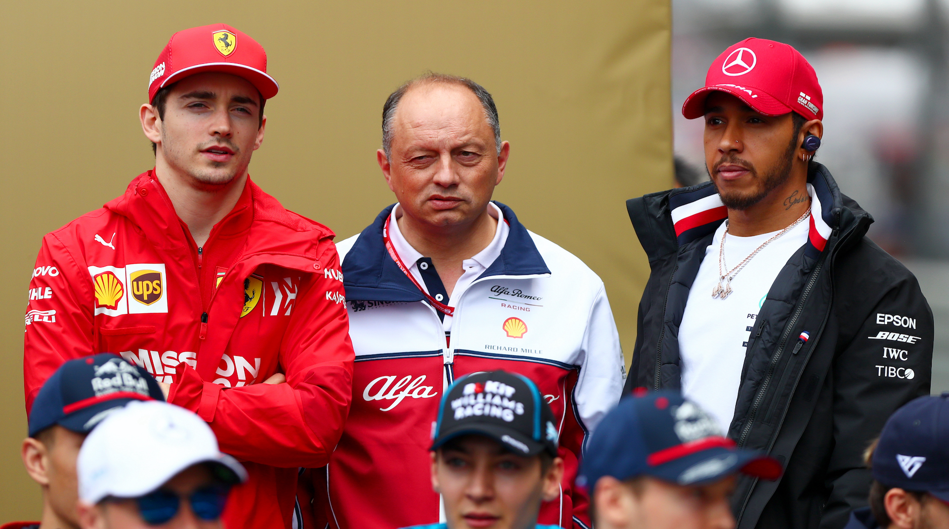 Charles Leclerc of Monaco and Ferrari, Alfa Romeo Racing Team Principal Frederic Vasseur and Lewis Hamilton of Great Britain and Mercedes GP look on before the F1 Grand Prix of China at Shanghai International Circuit on April 14, 2019 in Shanghai, China.