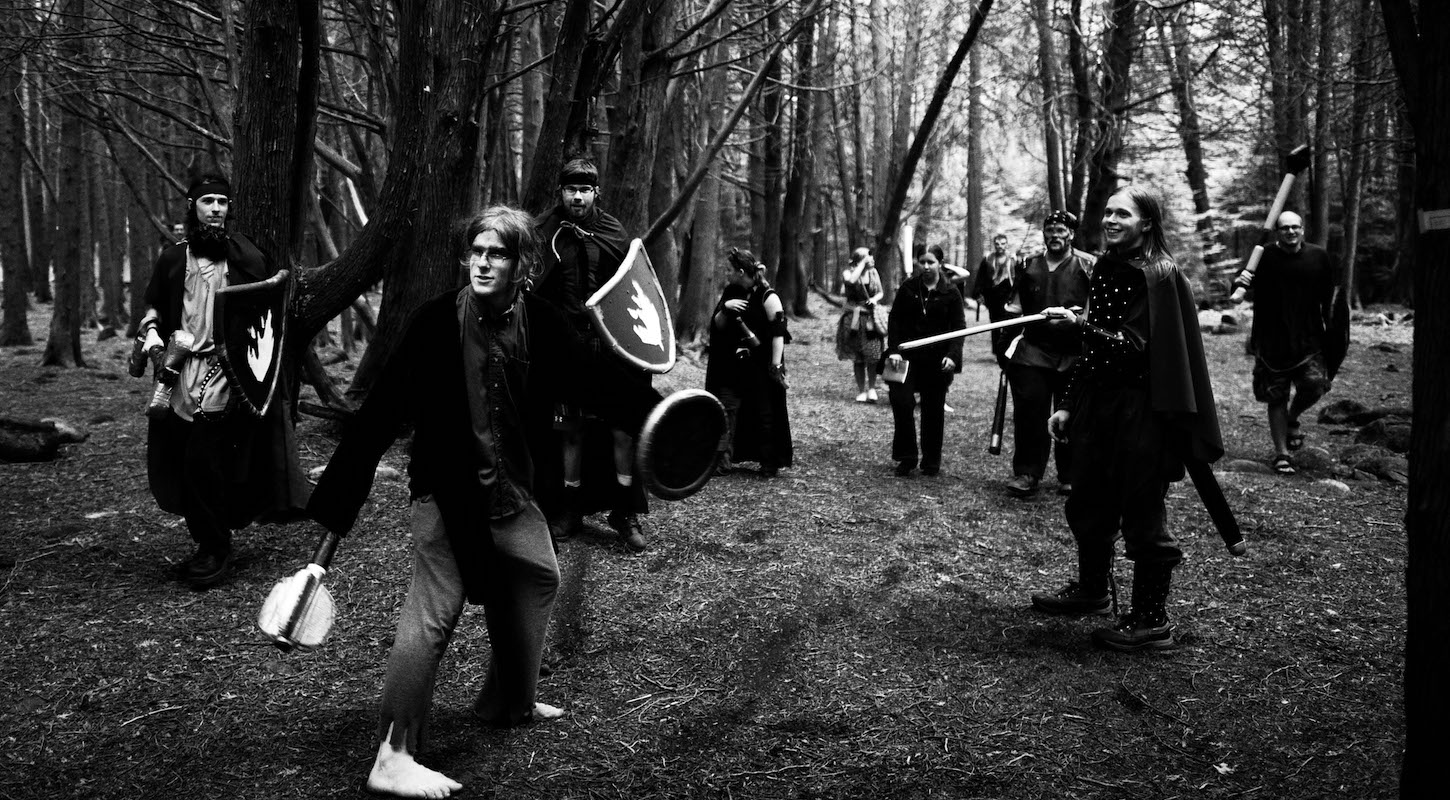 In this photograph a group of townsfolk descend on a disciple after it was discovered that the ritual he participated in left a person dead during an Epoch Event in Toronto on August 6, 2011