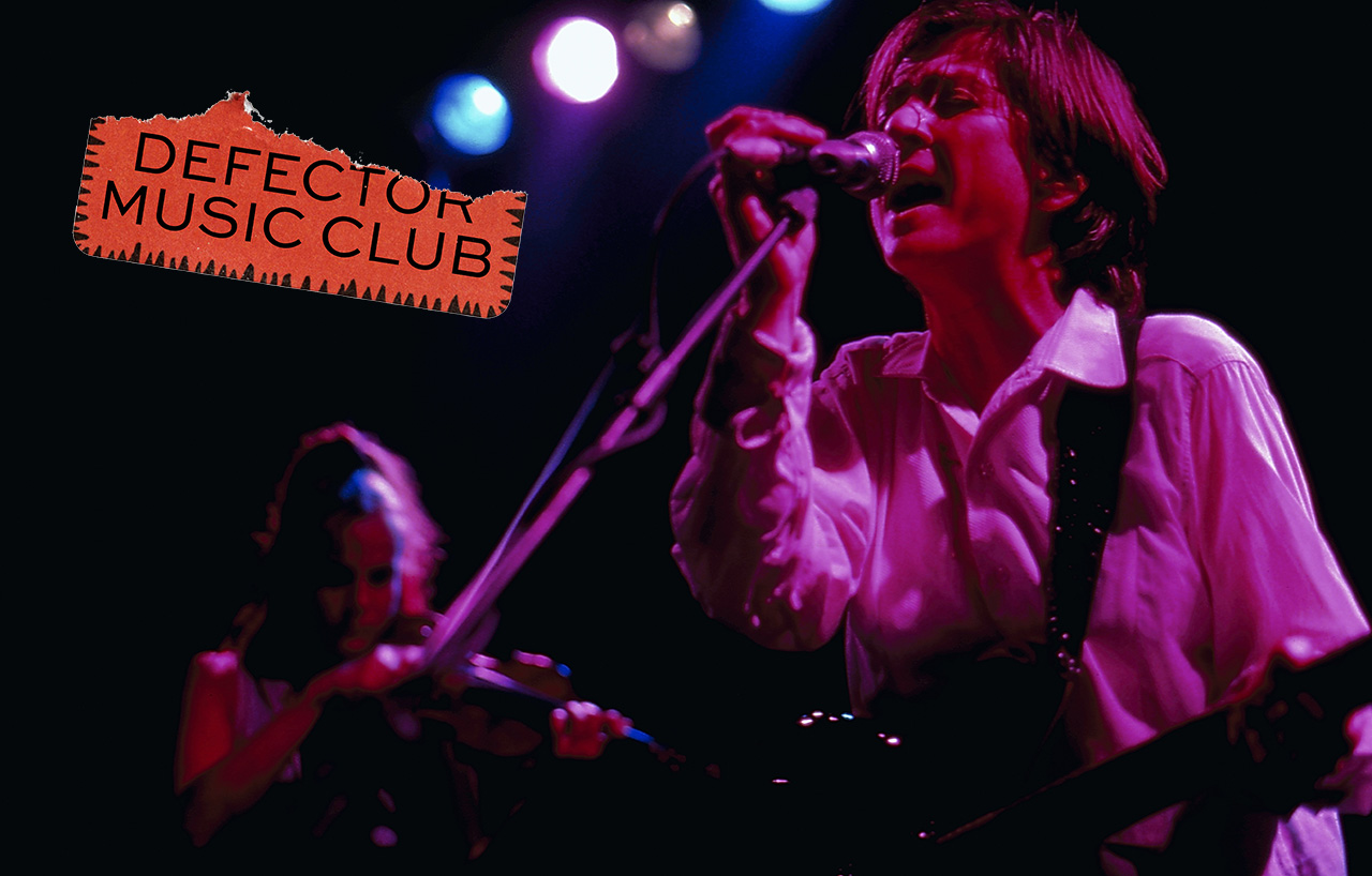 Ana da Silva, lead singer of The Raincoats, on stage with the band in 1995.