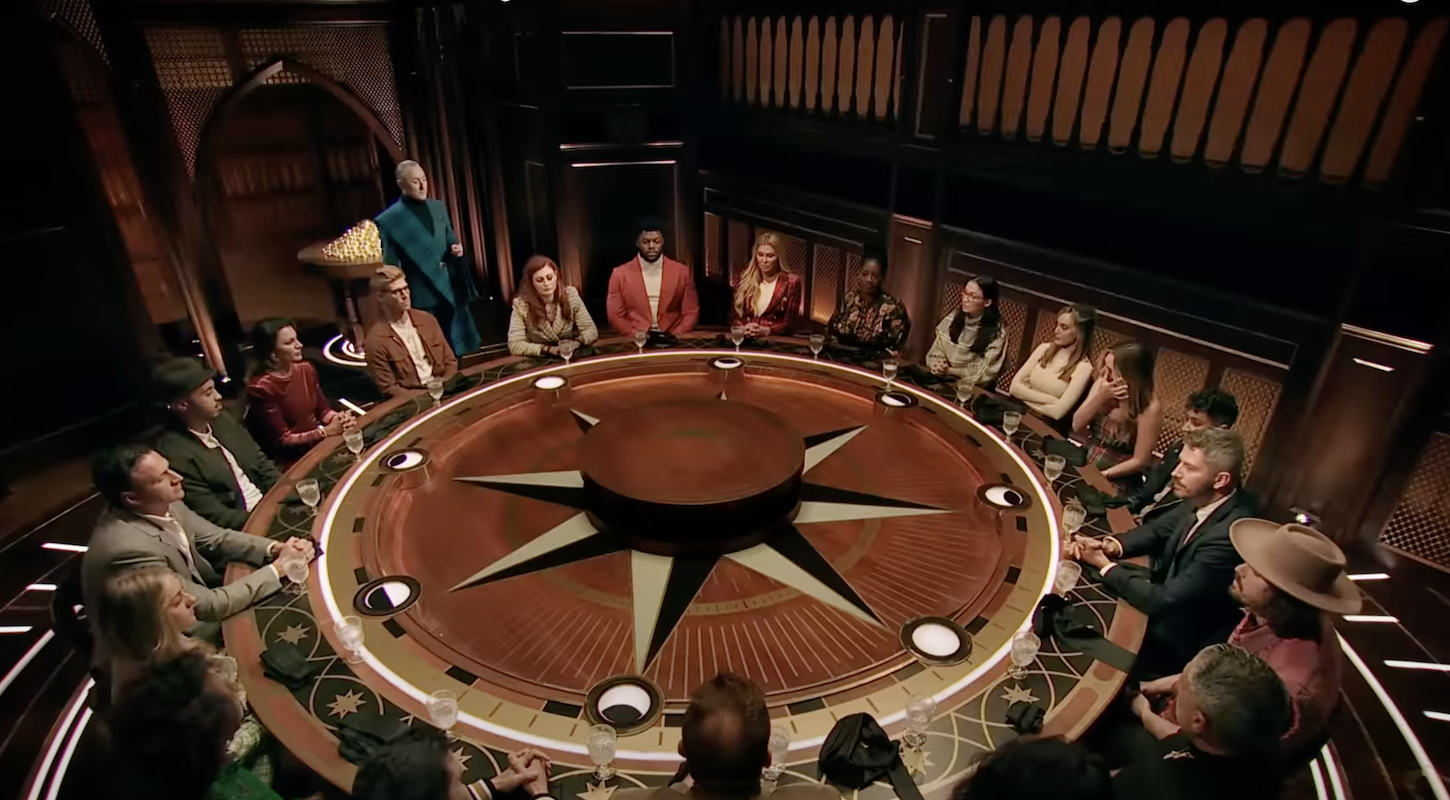 The Traitors cast arrayed around the round table.