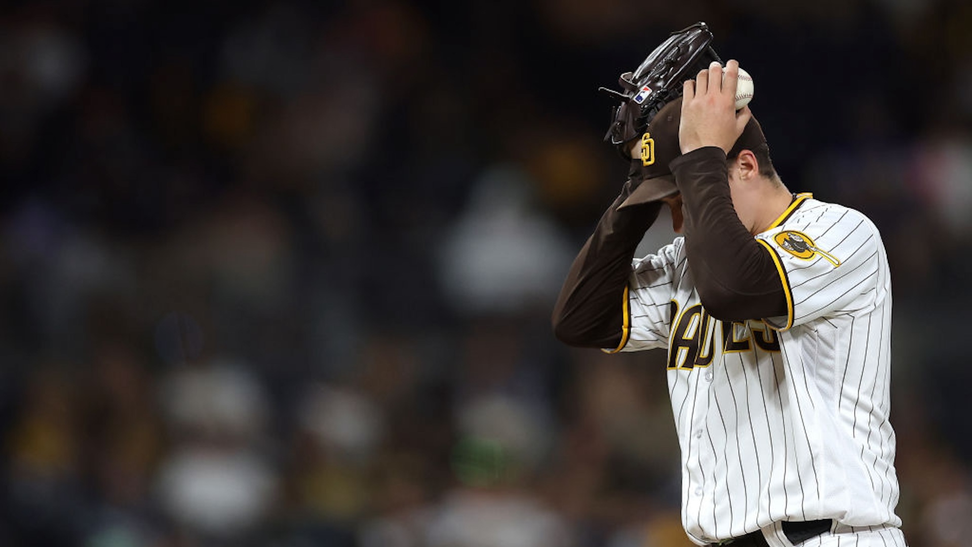 Blake Snell #4 of the San Diego Padres looks on during the sixth inning of a game against the Colorado Rockies at PETCO Park on September 19, 2023 in San Diego, California.