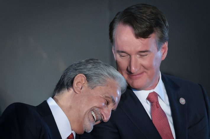Ted Leonsis snuggles with Glenn Youngkin.