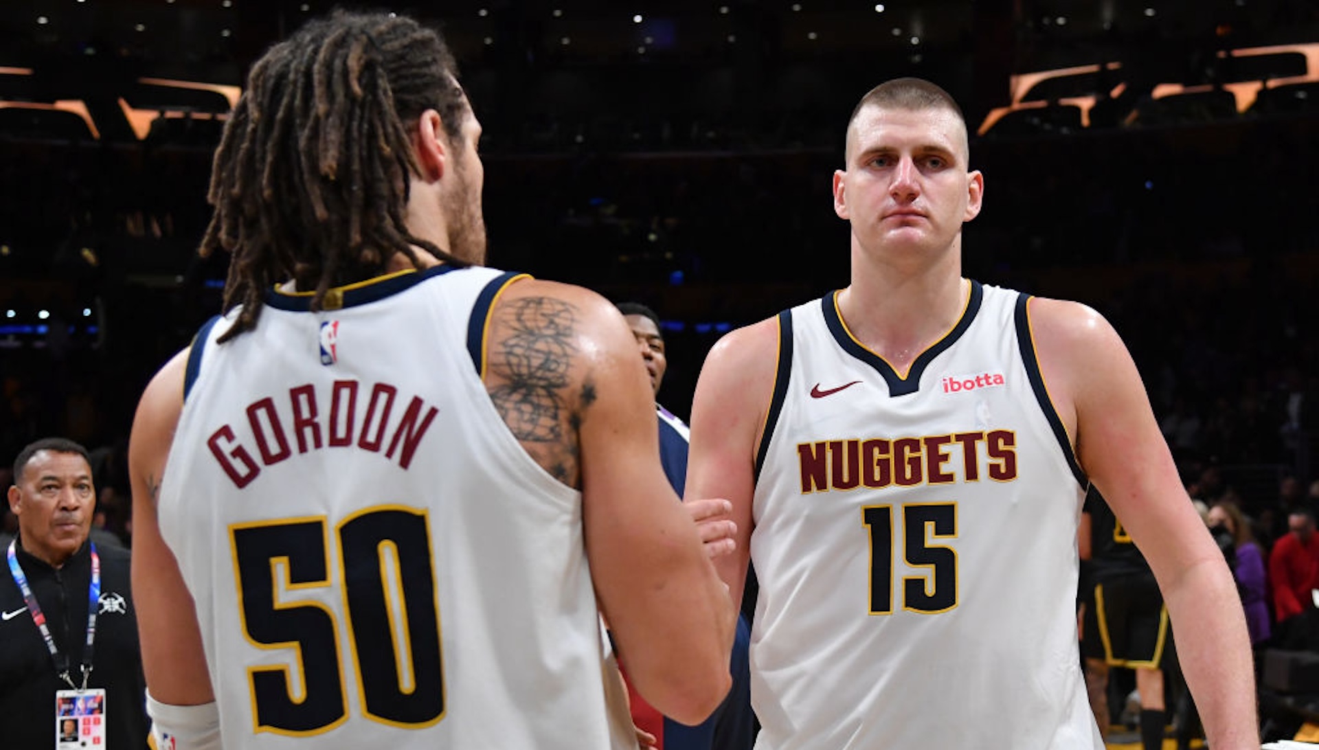 Nikola Jokic #15 high fives Aaron Gordon #50 of the Denver Nuggets after the game against the Los Angeles Lakers on February 8, 2024 NBAE at Crypto.Com Arena in Los Angeles, California.