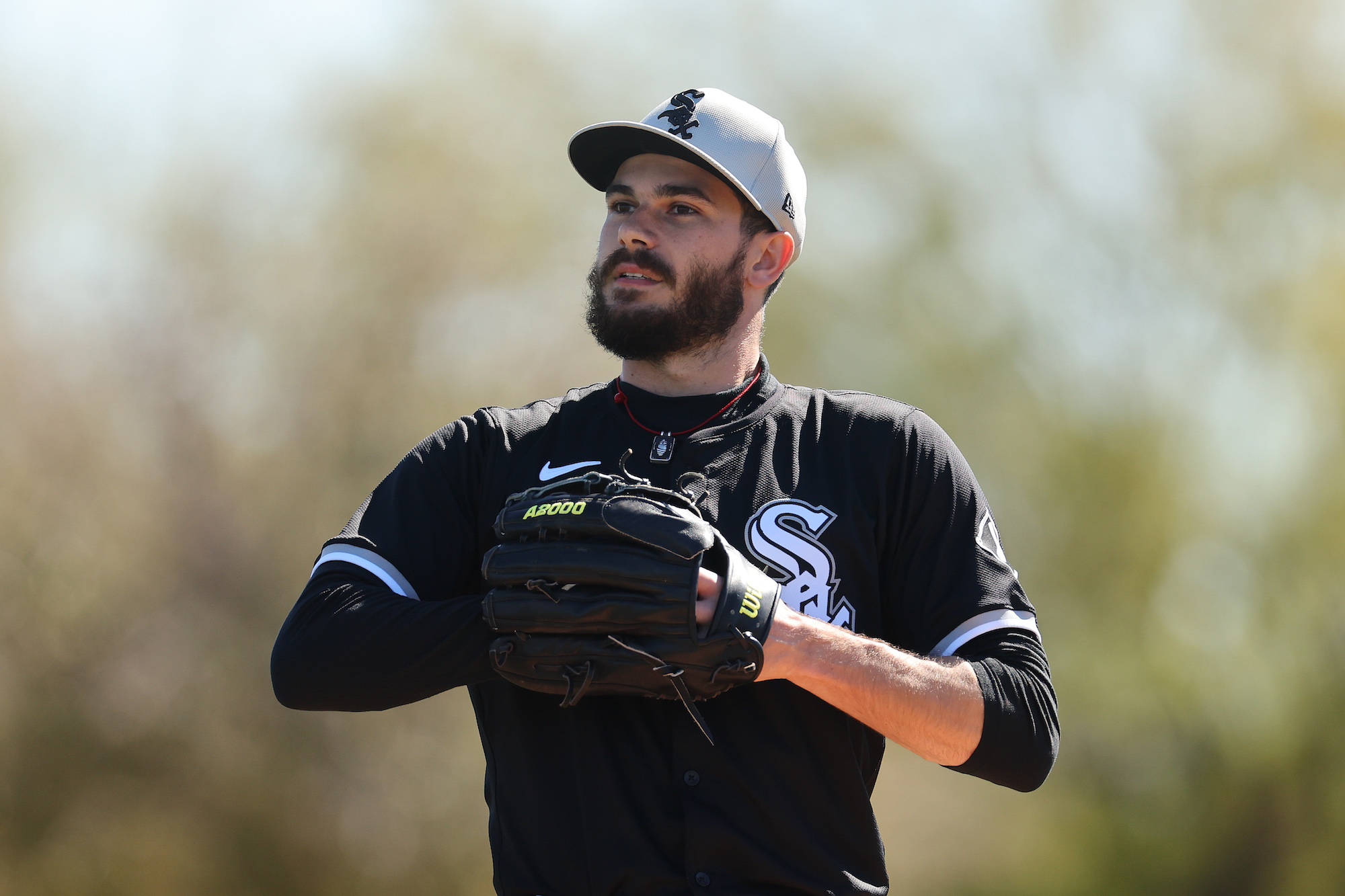 GLENDALE, ARIZONA - FEBRUARY 21: Dylan Cease #84 of the Chicago White Sox looks on during a spring training workout at Camelback Ranch on February 21, 2024 in Glendale, Arizona. (Photo by Michael Reaves/Getty Images)