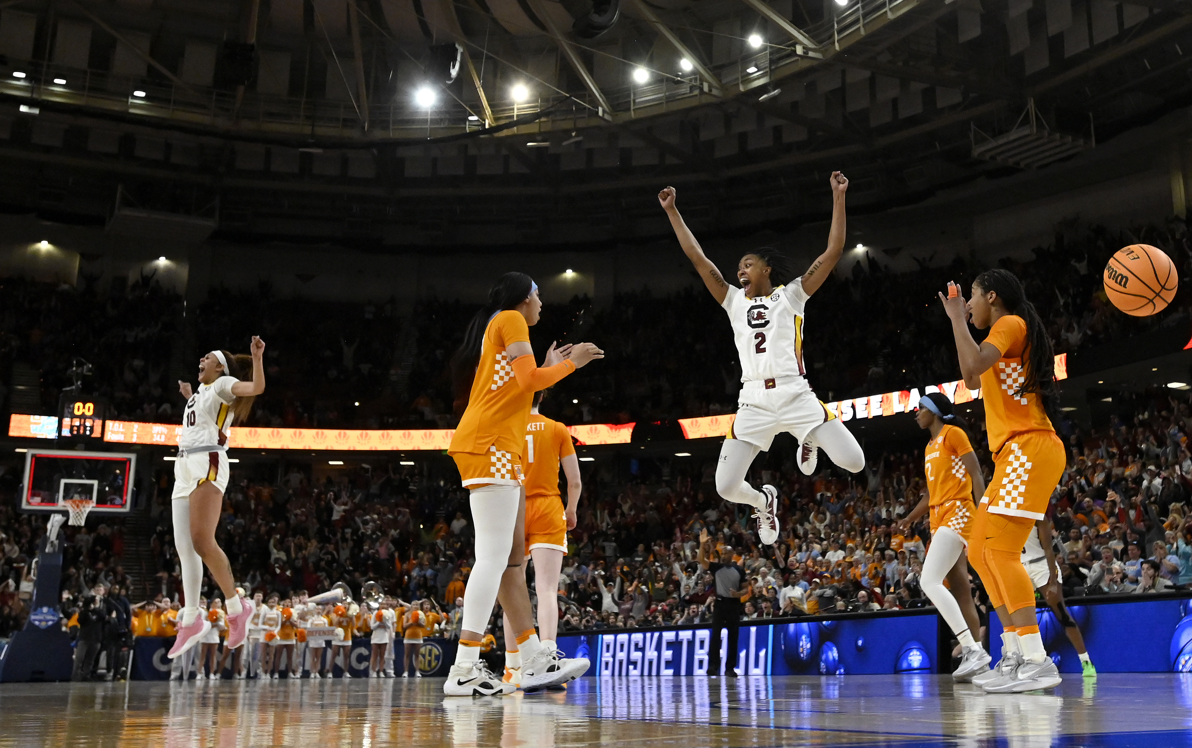 Ashlyn Watkins and Kamilla Cardoso celebrate the South Carolina buzzer beater