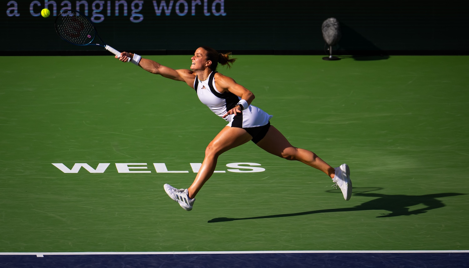 INDIAN WELLS, CALIFORNIA - MARCH 13: Maria Sakkari of Greece in action against Diane Parry of France in the fourth round on Day 11 of the BNP Paribas Open at Indian Wells Tennis Garden on March 13, 2024 in Indian Wells, California (Photo by Robert Prange/Getty Images)