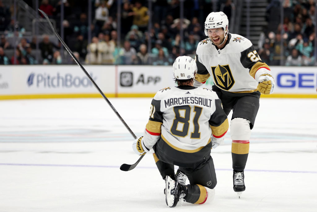 Jonathan Marchessault #81 of the Vegas Golden Knights celebrates his game-tying goal with Shea Theodore